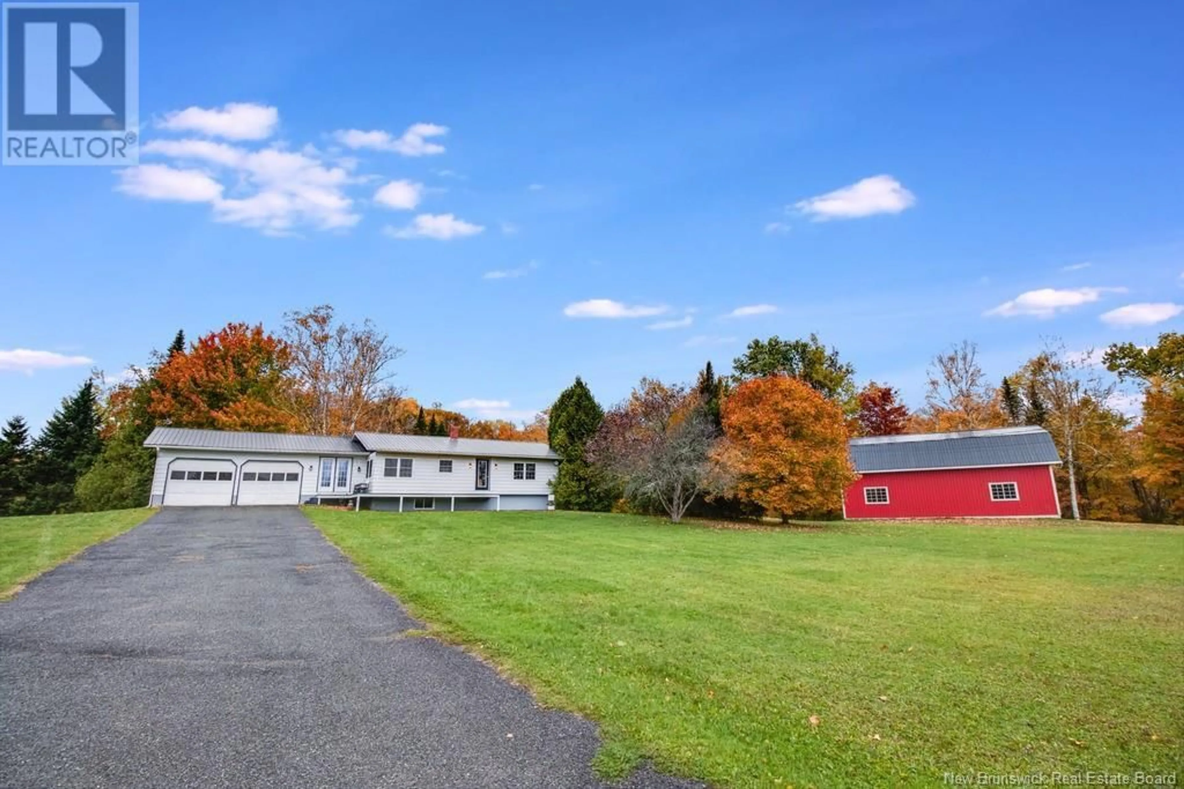 A pic from exterior of the house or condo, the fenced backyard for 3901 560 Route, Knoxford New Brunswick E7K2R5