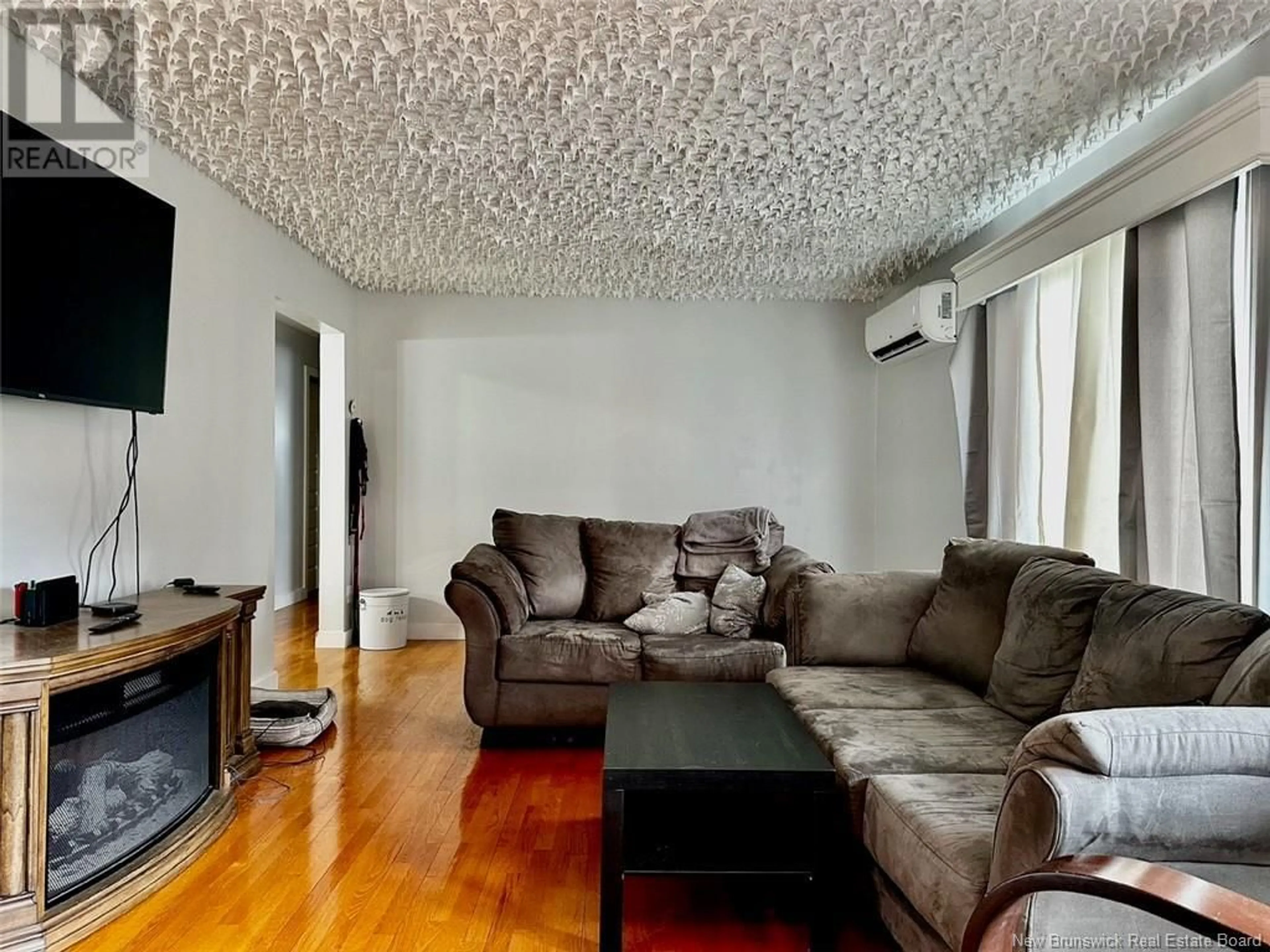 Living room, wood floors for 356 Sunset Drive, Dalhousie New Brunswick E8C2M1