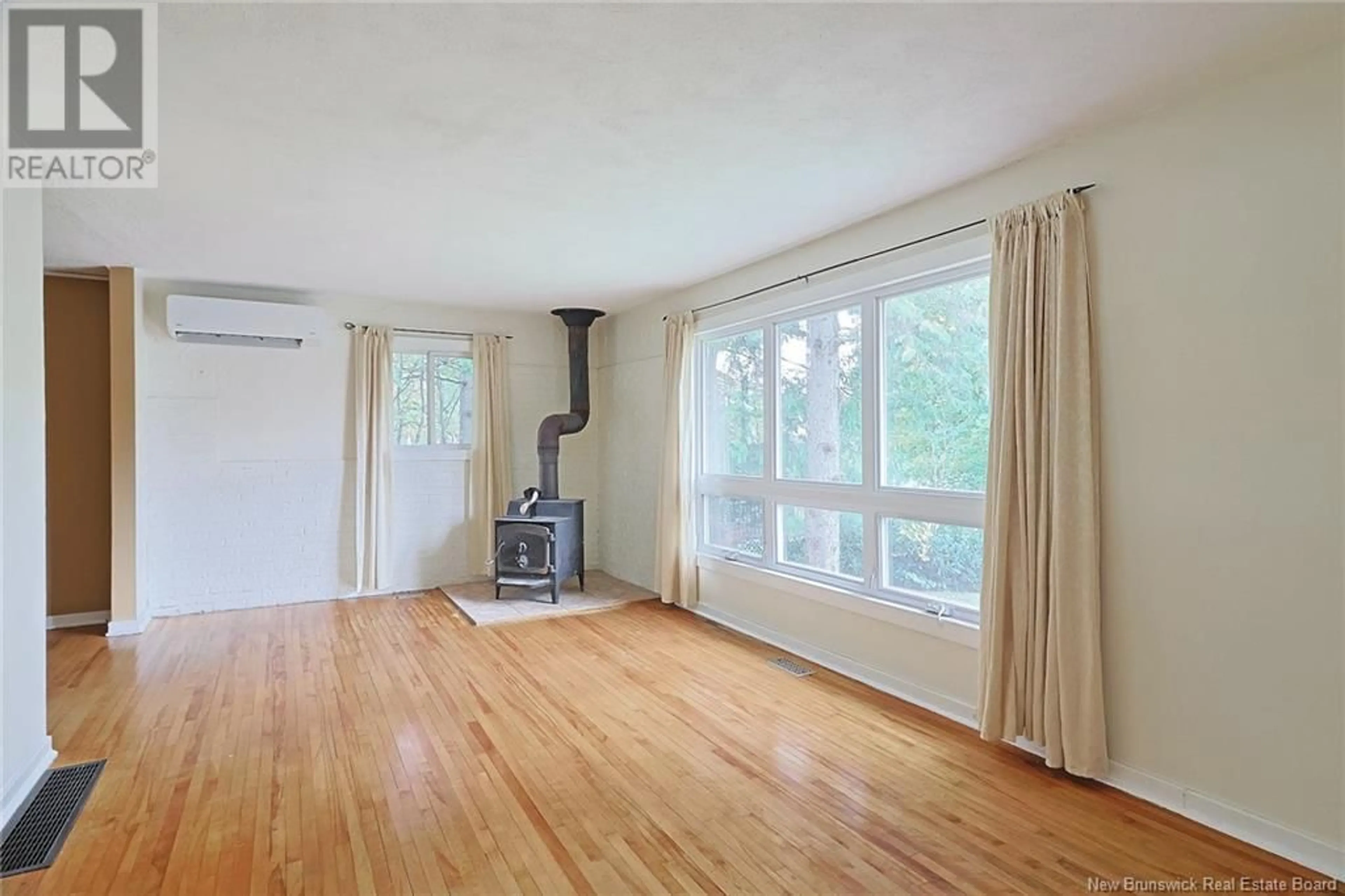 A pic of a room, wood floors for 25 Westwood Drive, Fredericton New Brunswick E3C1K7