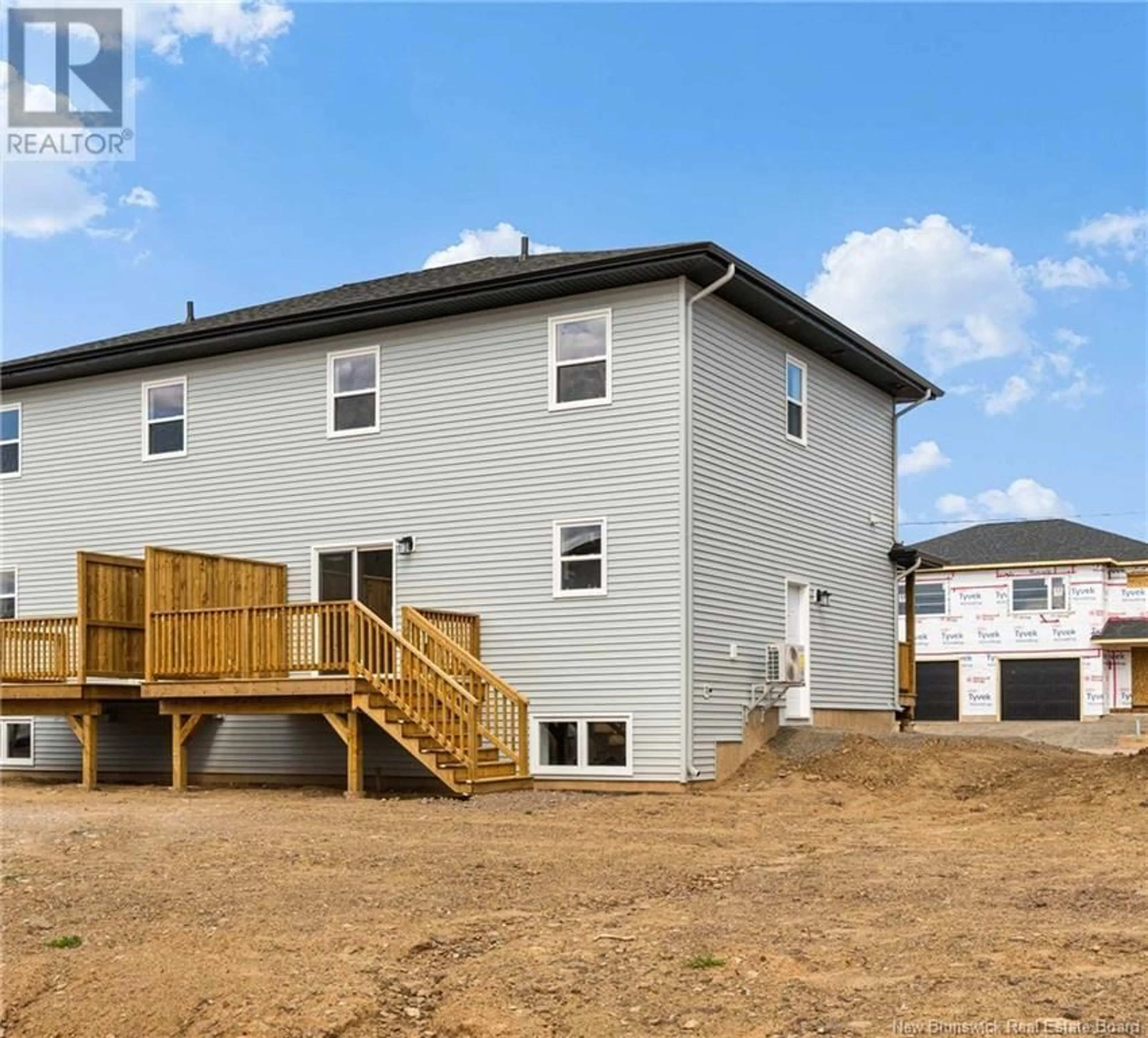 Frontside or backside of a home, the fenced backyard for 17 Foxtrot Street, Dieppe New Brunswick E1K0A4