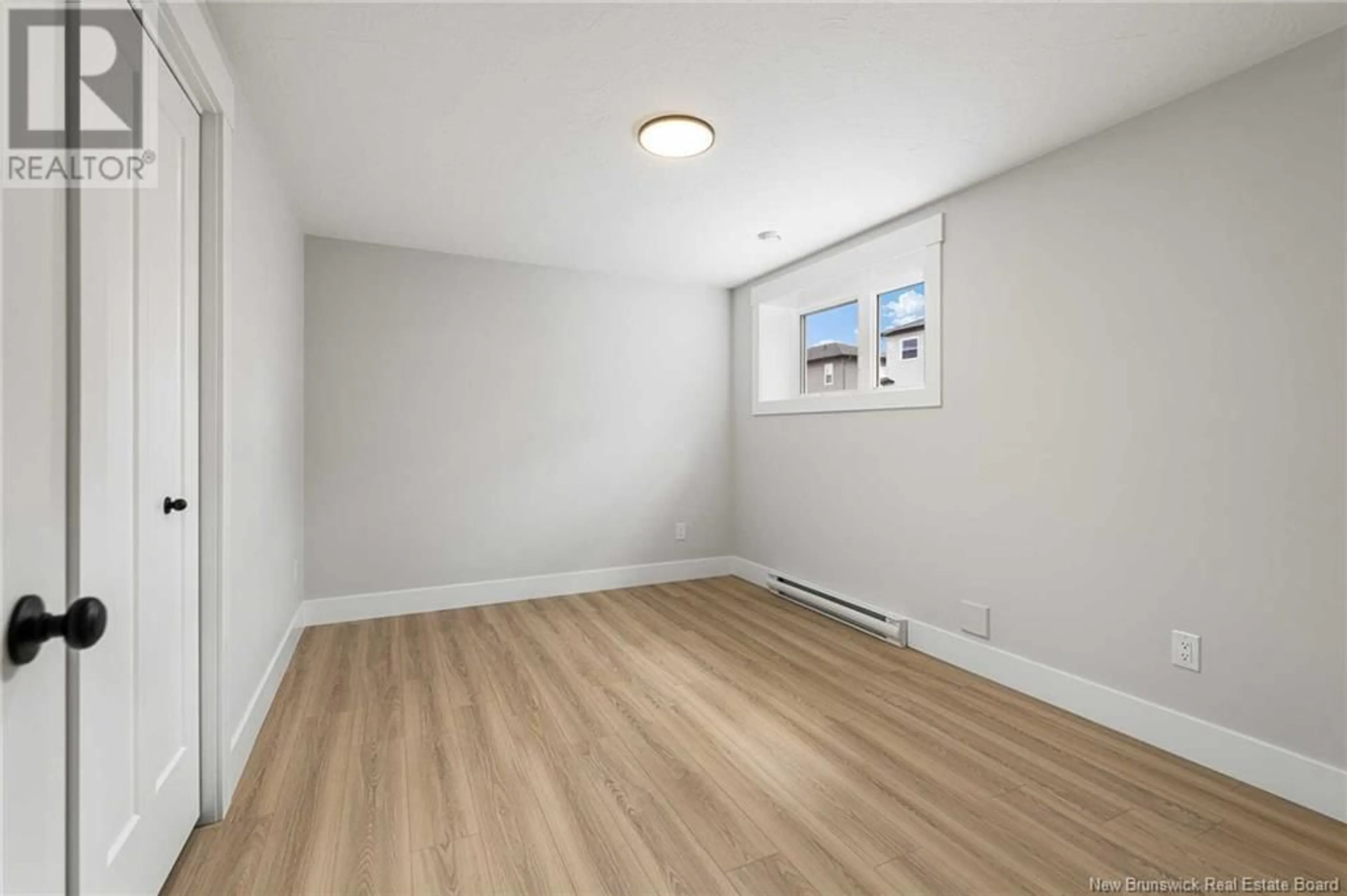 A pic of a room, wood floors for 17 Foxtrot Street, Dieppe New Brunswick E1K0A4