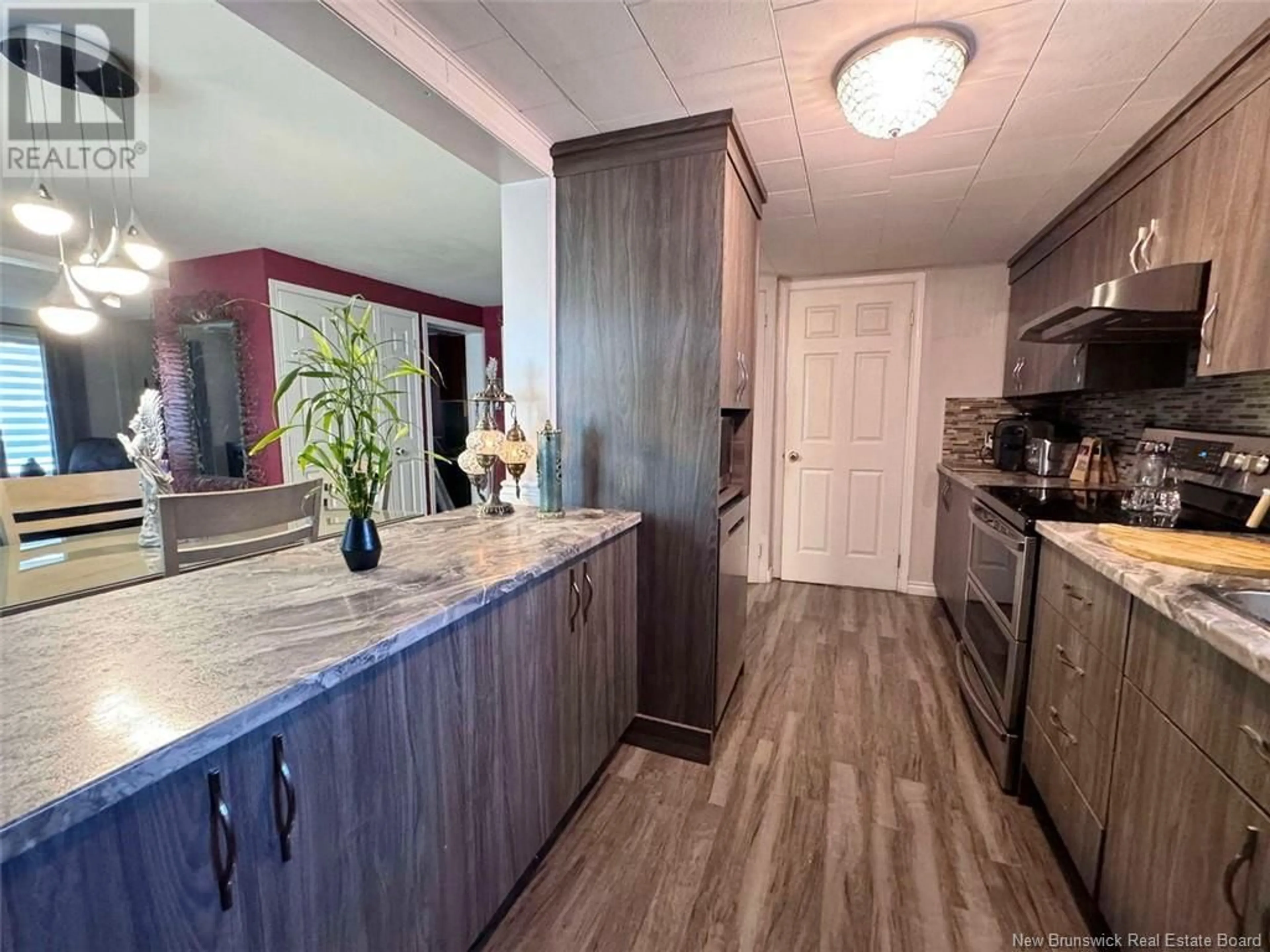 Open concept kitchen for 55 Riviere à la Truite Road, Saint-Jacques New Brunswick E7B1N4