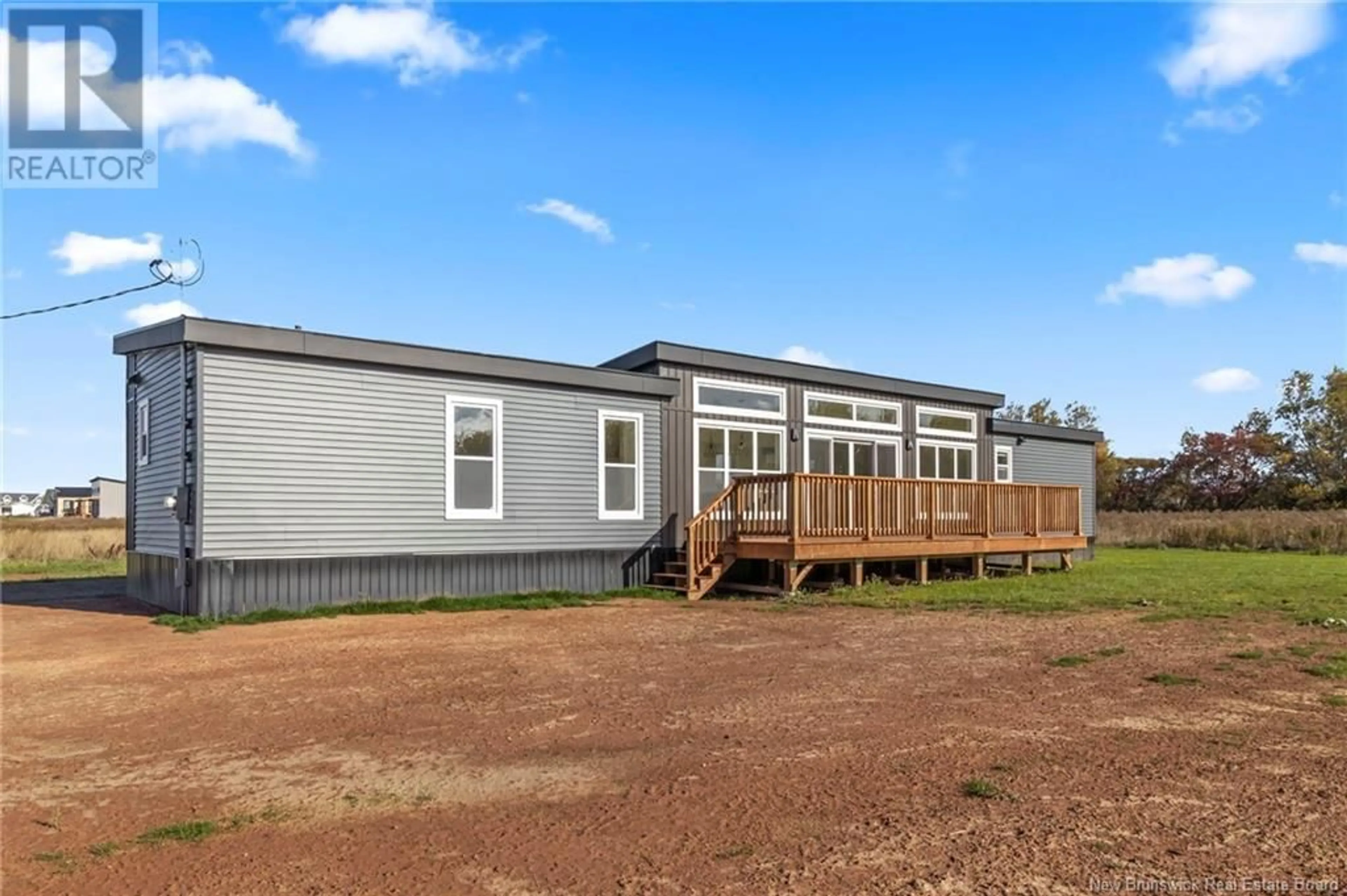 Home with vinyl exterior material for 42 Bedeche Street, Cap-Pelé New Brunswick E4N0G1