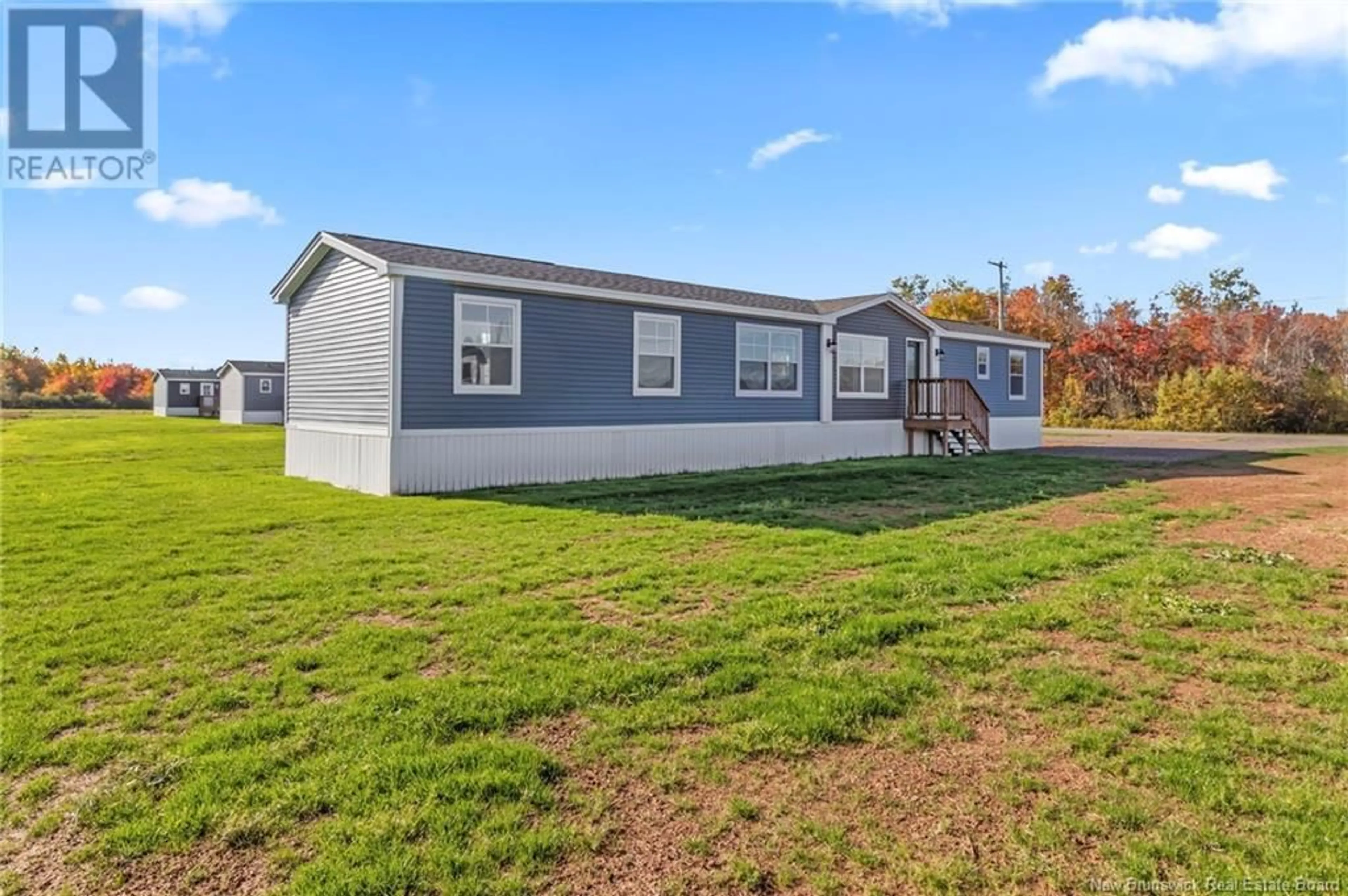 Home with vinyl exterior material for 46 Bedeche Street, Cap-Pelé New Brunswick E4N0G1