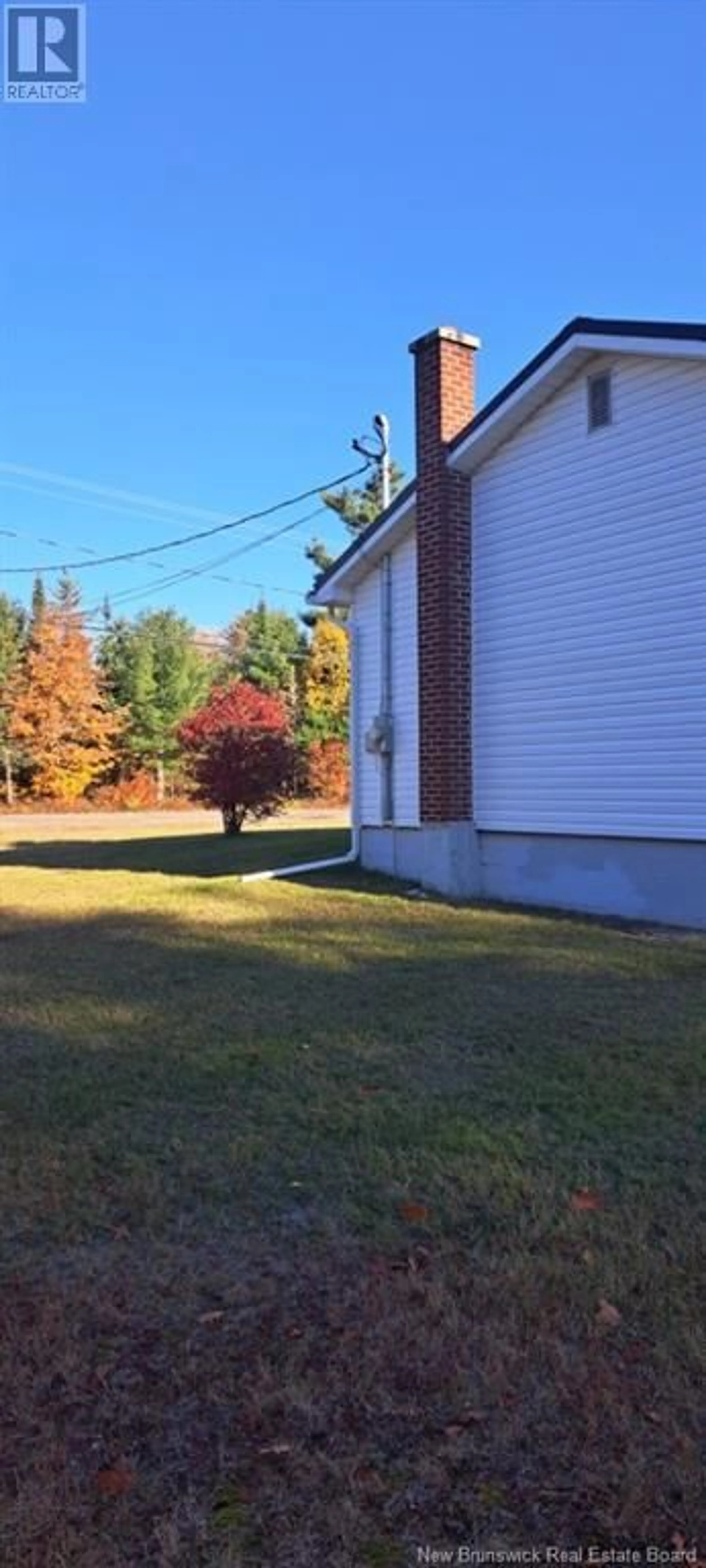 Frontside or backside of a home, the fenced backyard for 259 Saint Charles Sud, Saint-Charles New Brunswick E4W4V5