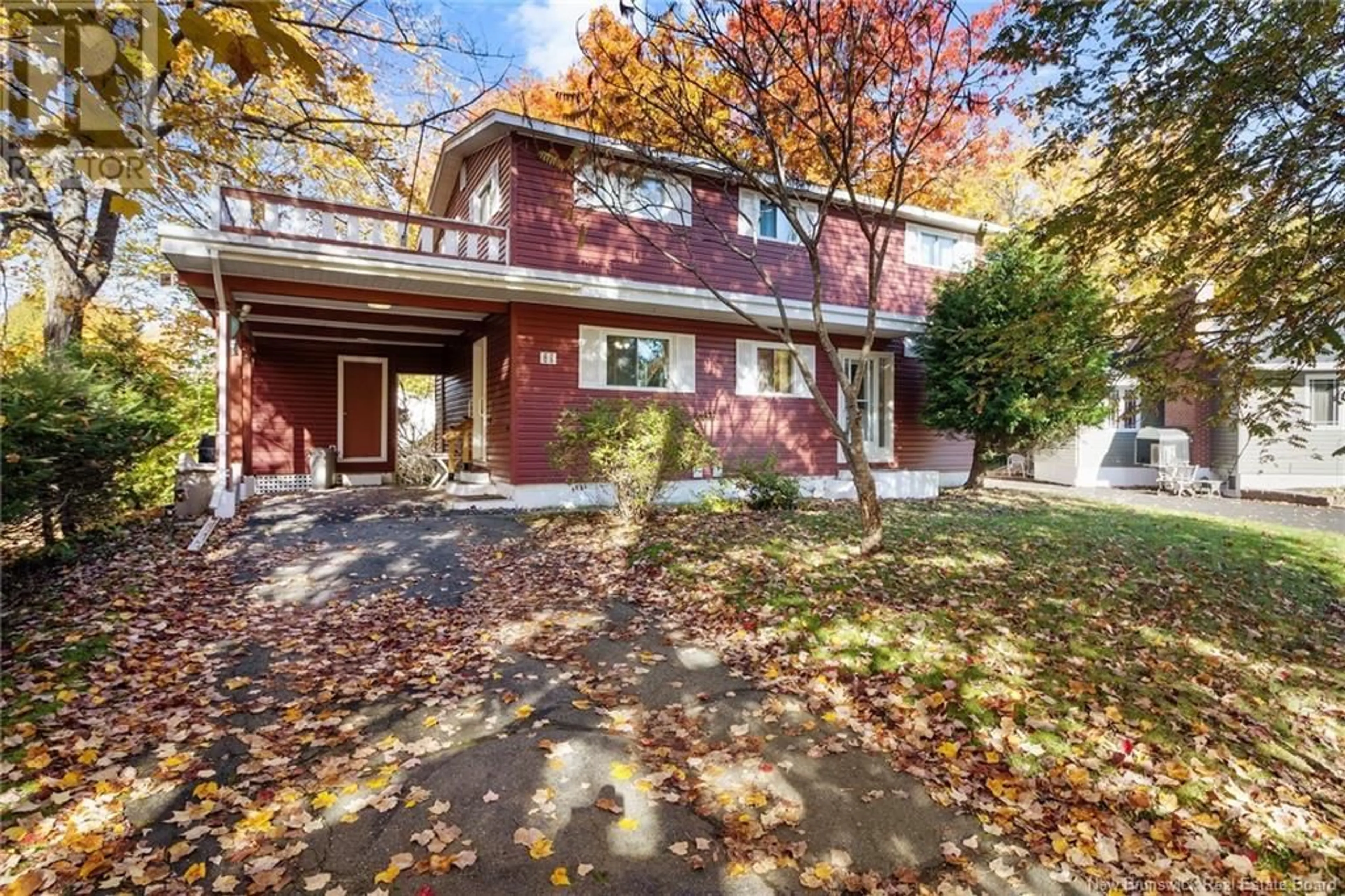 A pic from exterior of the house or condo, the street view for 21 Kennedy Court, Fredericton New Brunswick E3A3C9