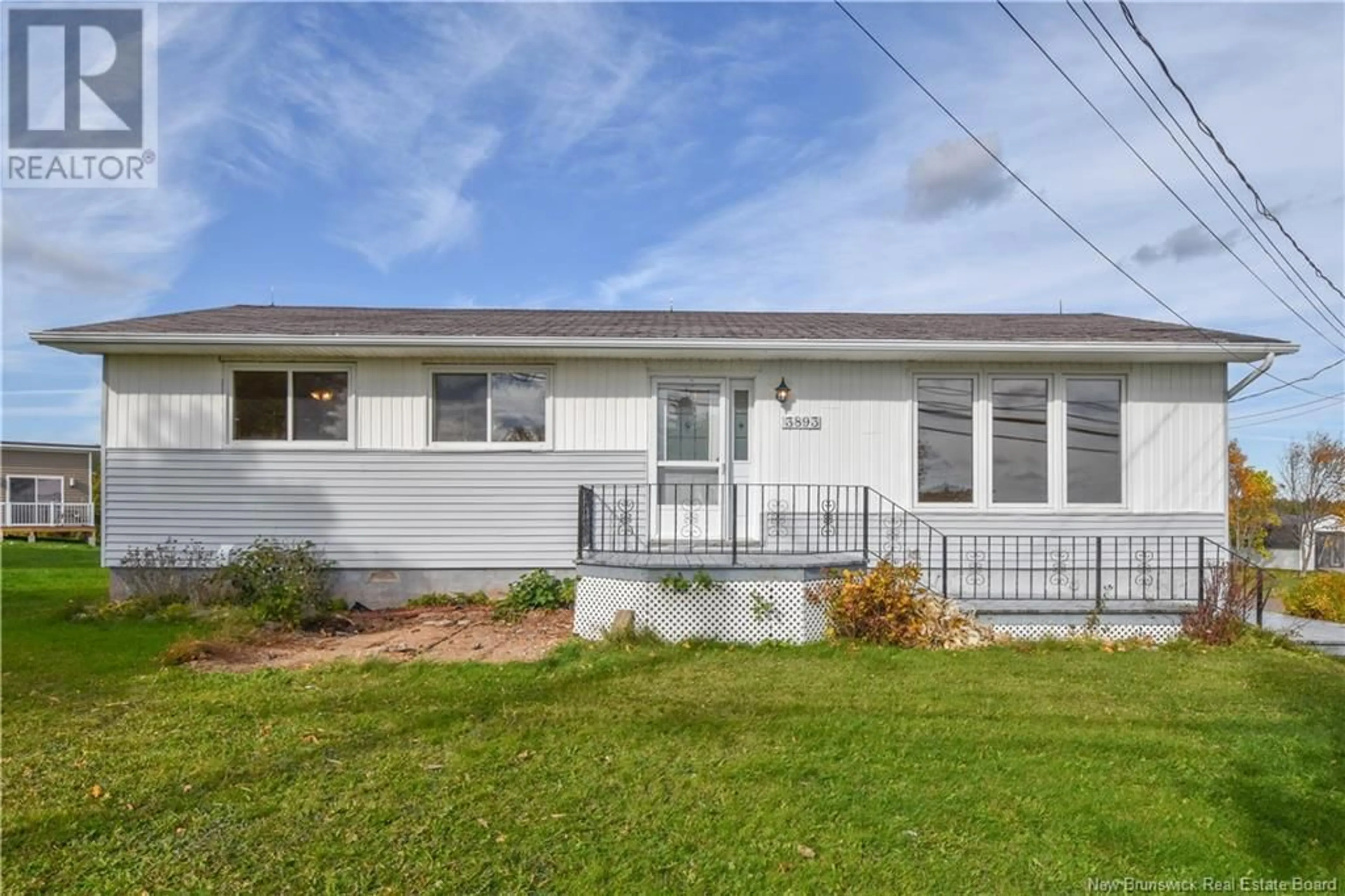 Home with vinyl exterior material, street for 3893 DES FONDATEURS BOULEVARD, Saint-Isidore New Brunswick E8M1C1