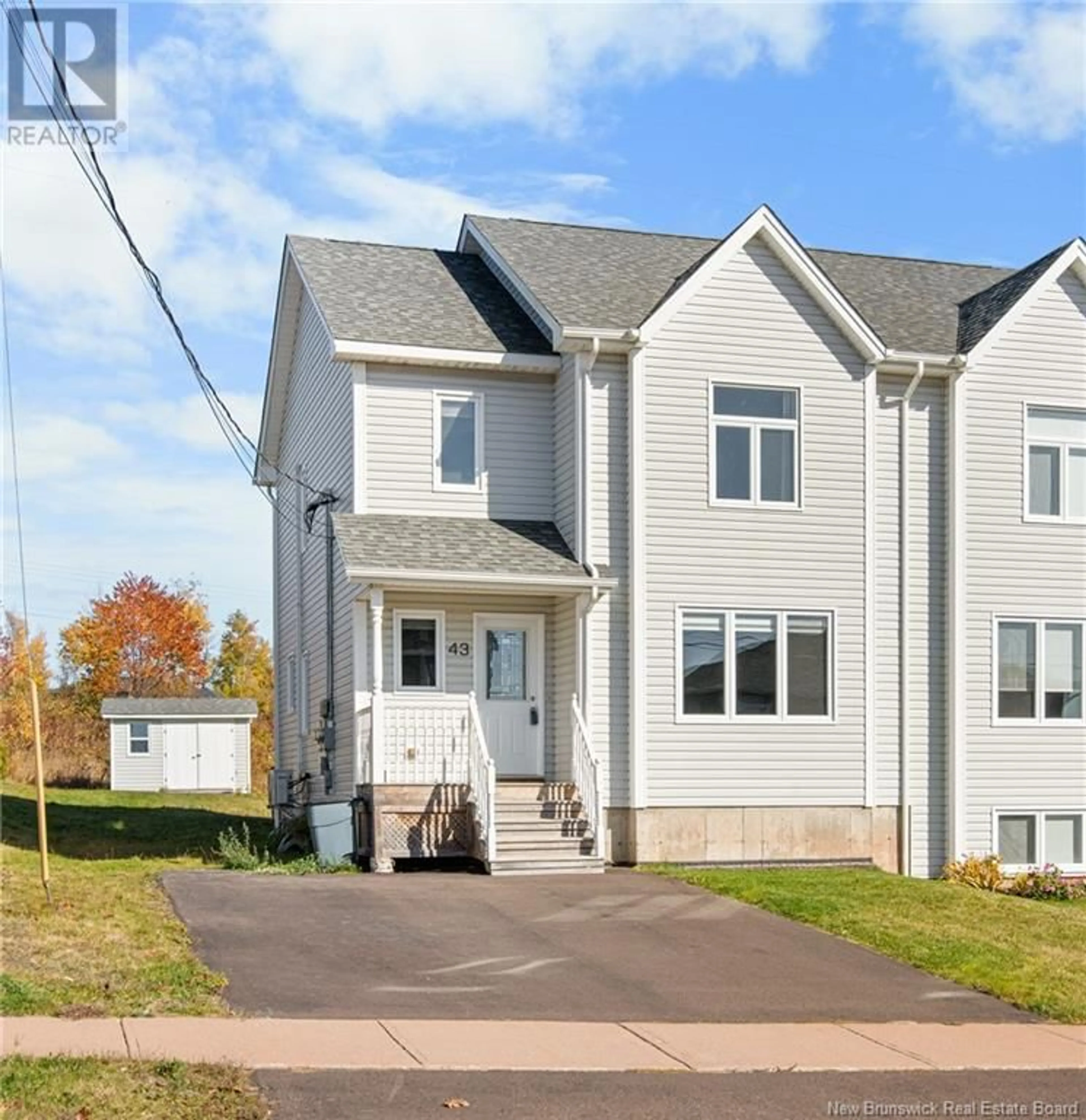 A pic from exterior of the house or condo, the street view for 43 Stillwater Drive, Moncton New Brunswick E1E0E3