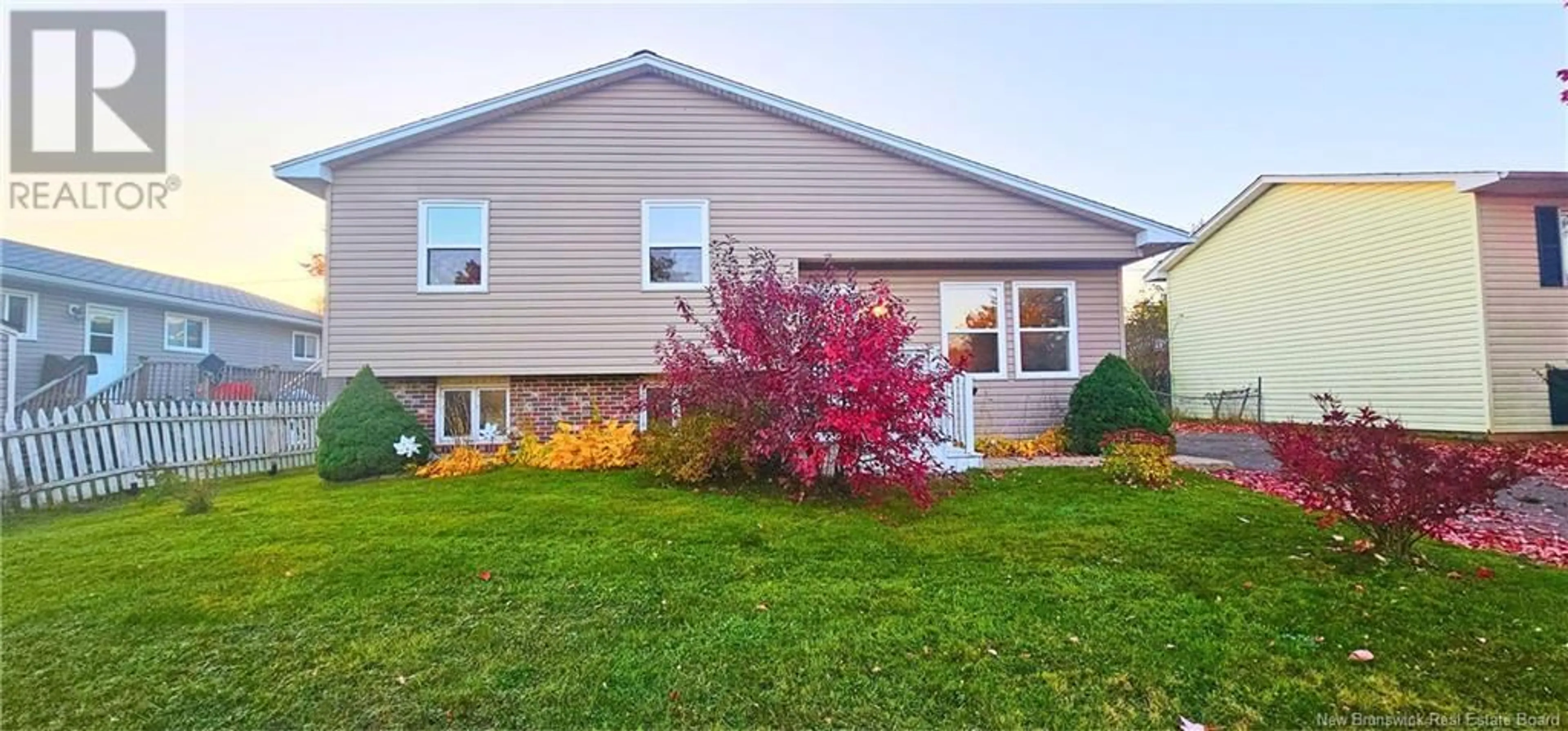 Frontside or backside of a home, the fenced backyard for 101 Evergreen Drive, Moncton New Brunswick E1G1Y3