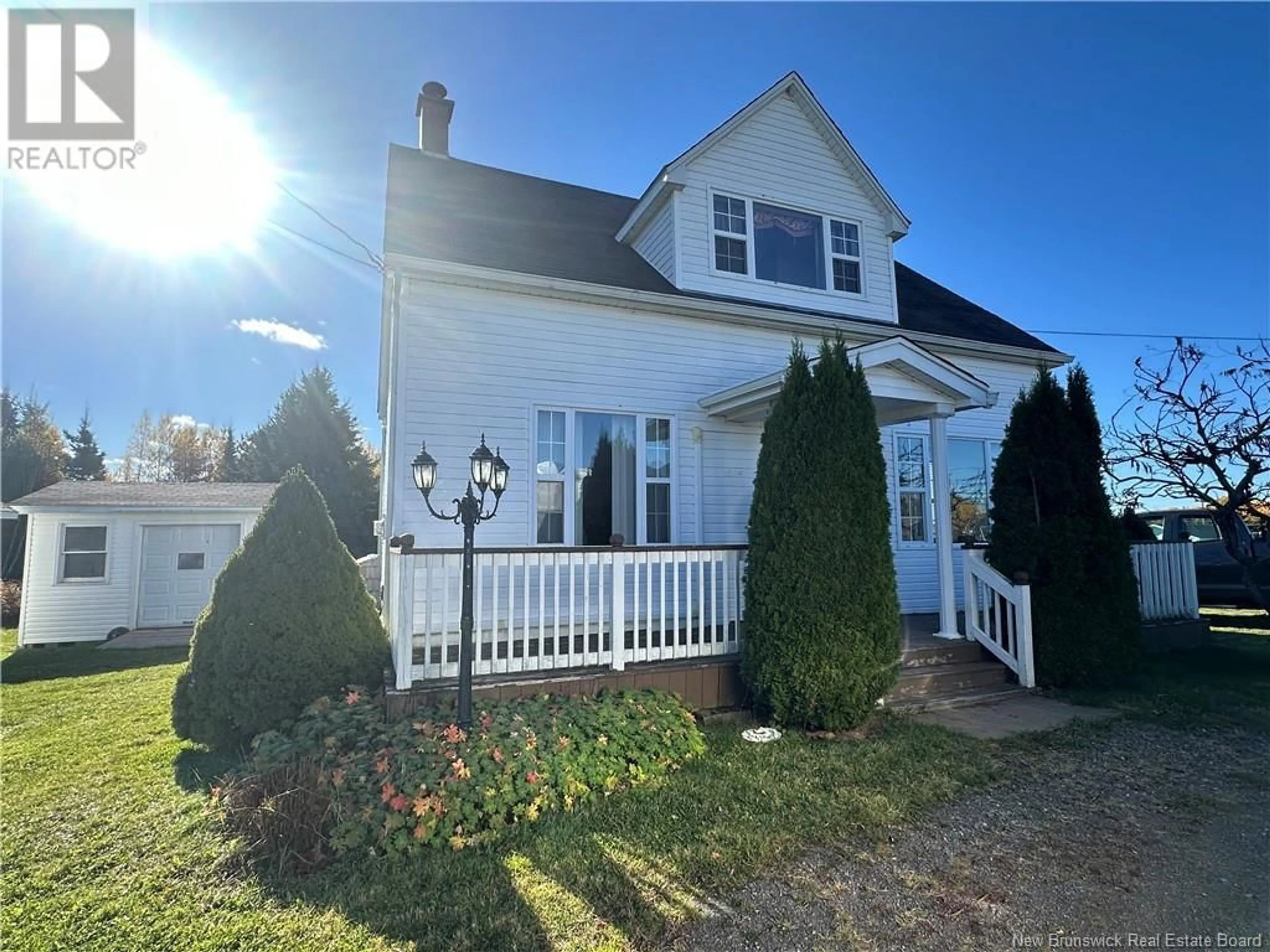 Frontside or backside of a home, the fenced backyard for 324 Irving Boulevard, Bouctouche New Brunswick E4S3M1