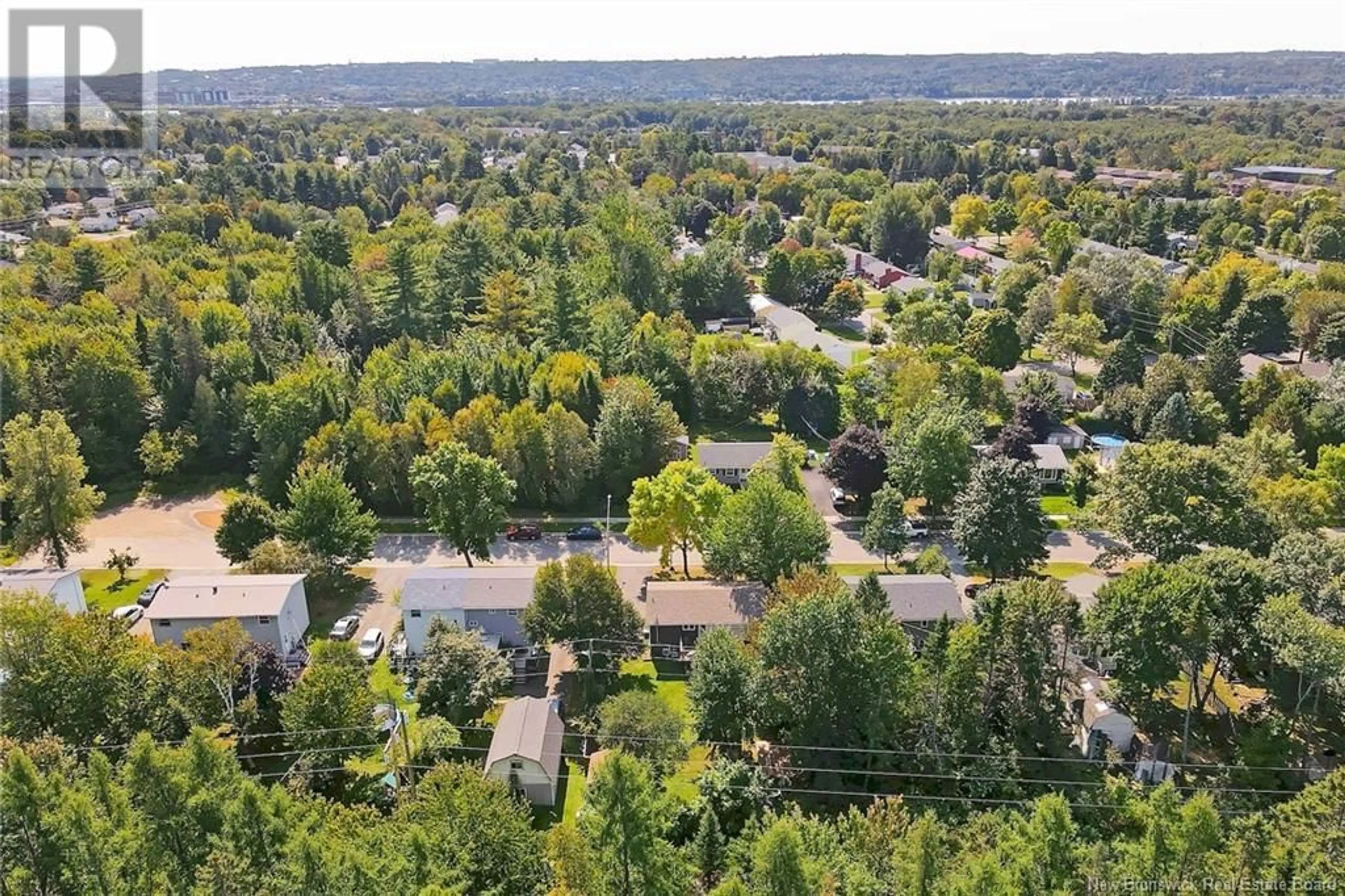 A pic from exterior of the house or condo, the street view for 91 Dykeman Street, Fredericton New Brunswick E3A5E5