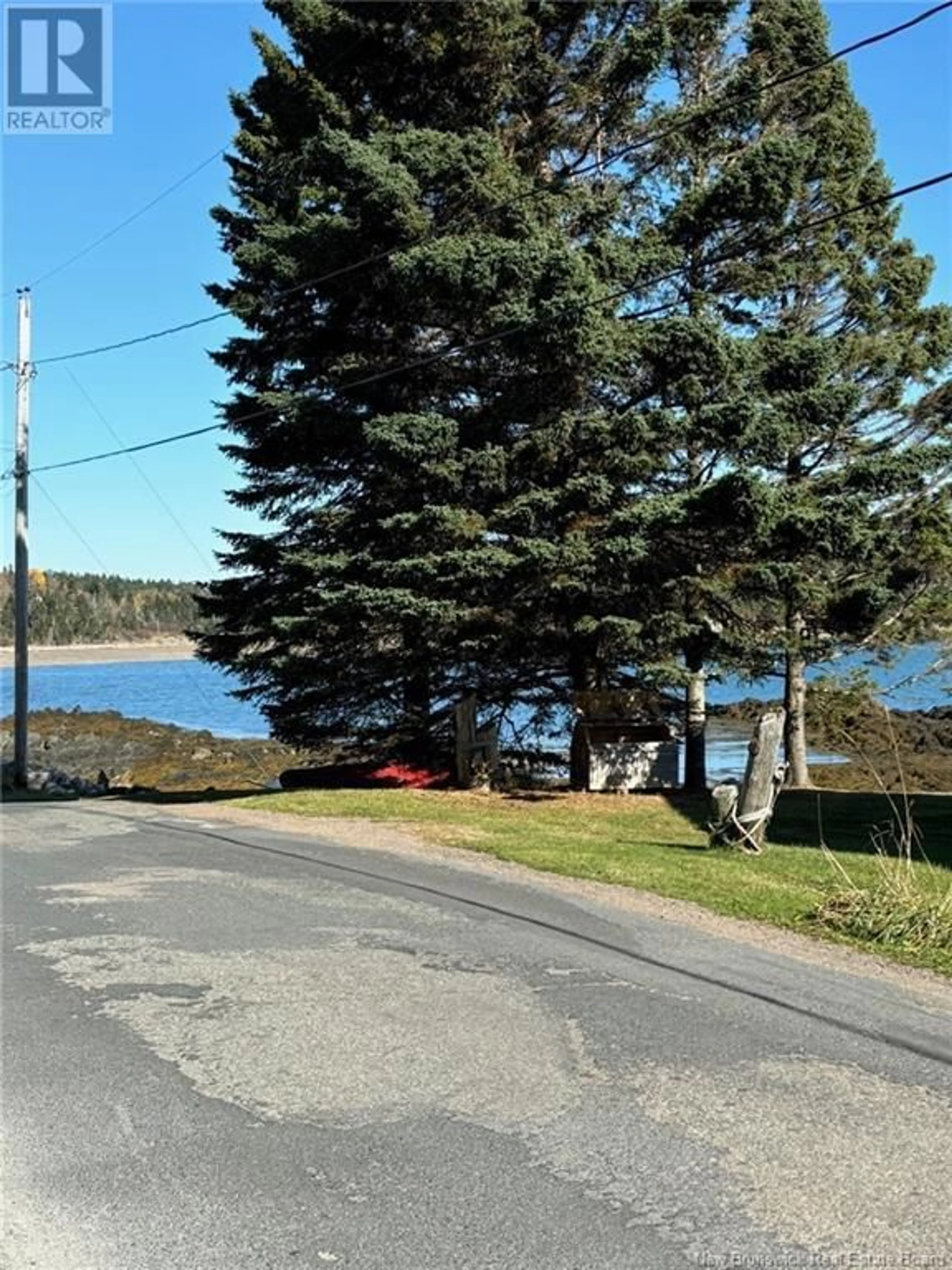 A pic from outside/outdoor area/front of a property/back of a property/a pic from drone, water/lake/river/ocean view for 20 BEACH, Beaver Harbour New Brunswick E5H1M5