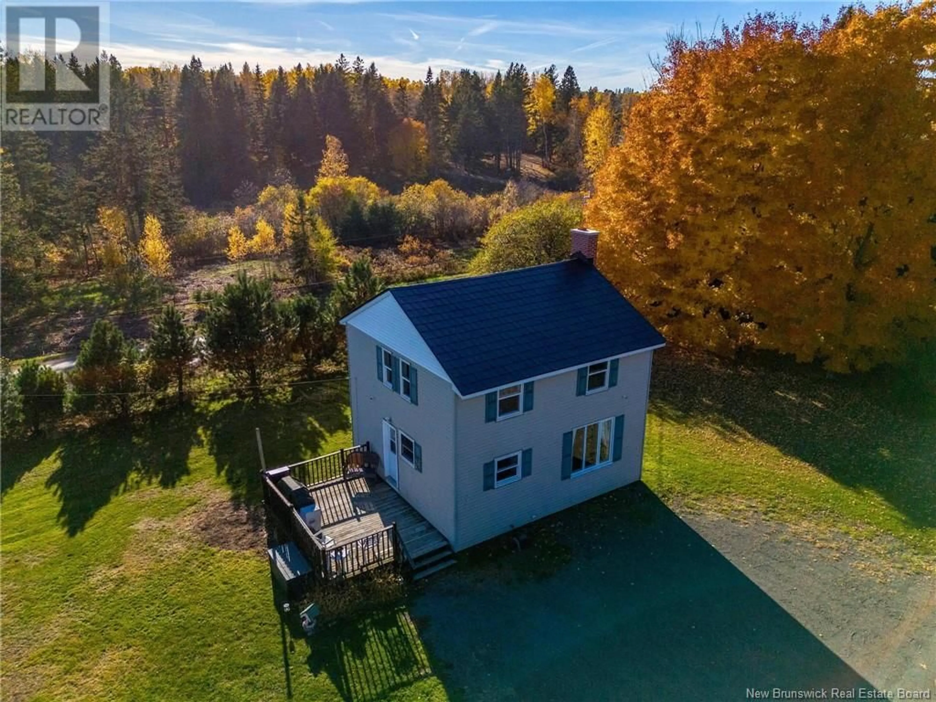 Frontside or backside of a home, the fenced backyard for 25 Pacific Junction Road, Berry Mills New Brunswick E1G2N8