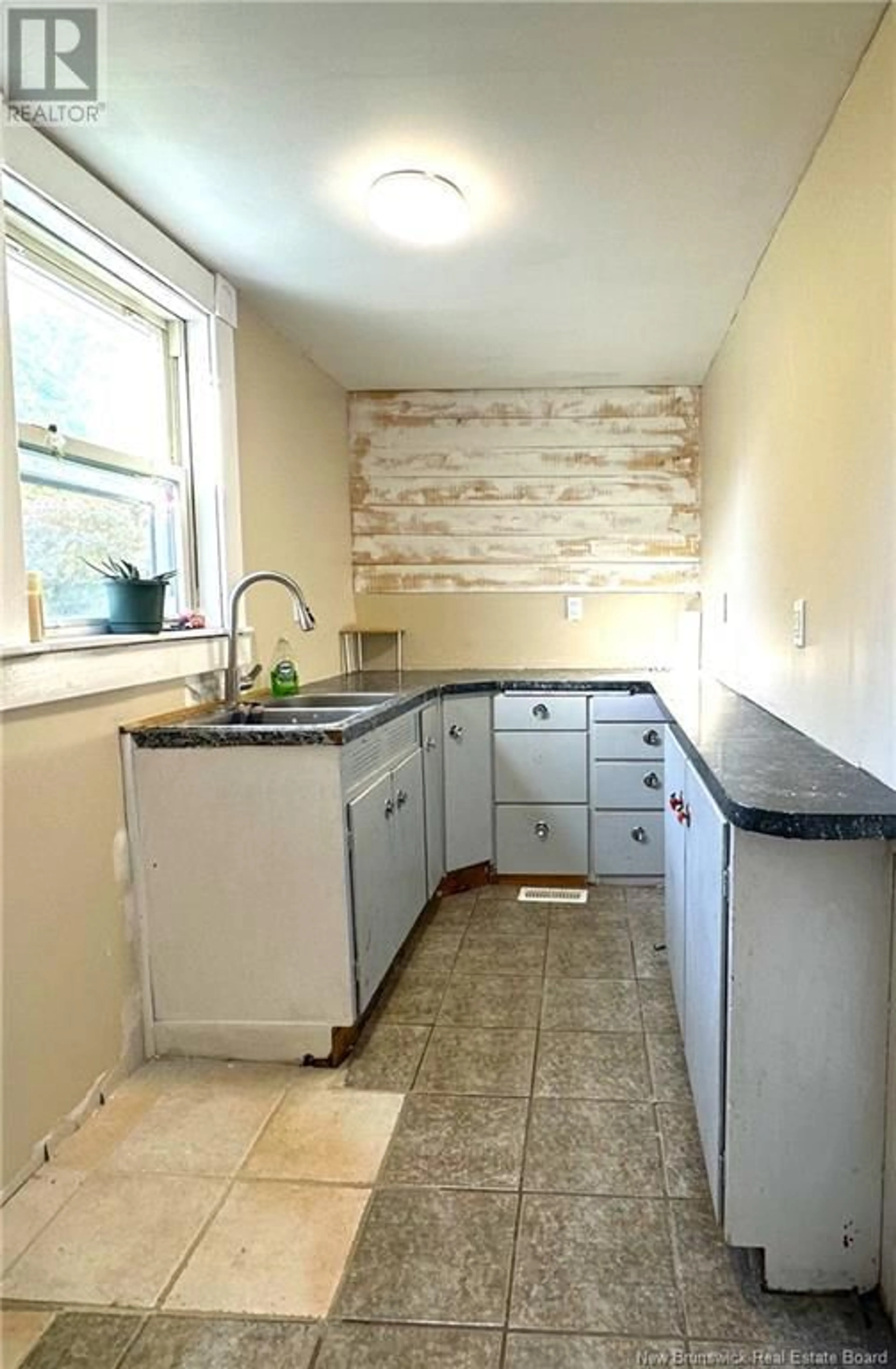 Kitchen, ceramic floors, cottage for 43 Parkwood Drive, St. Stephen New Brunswick E3L2W1