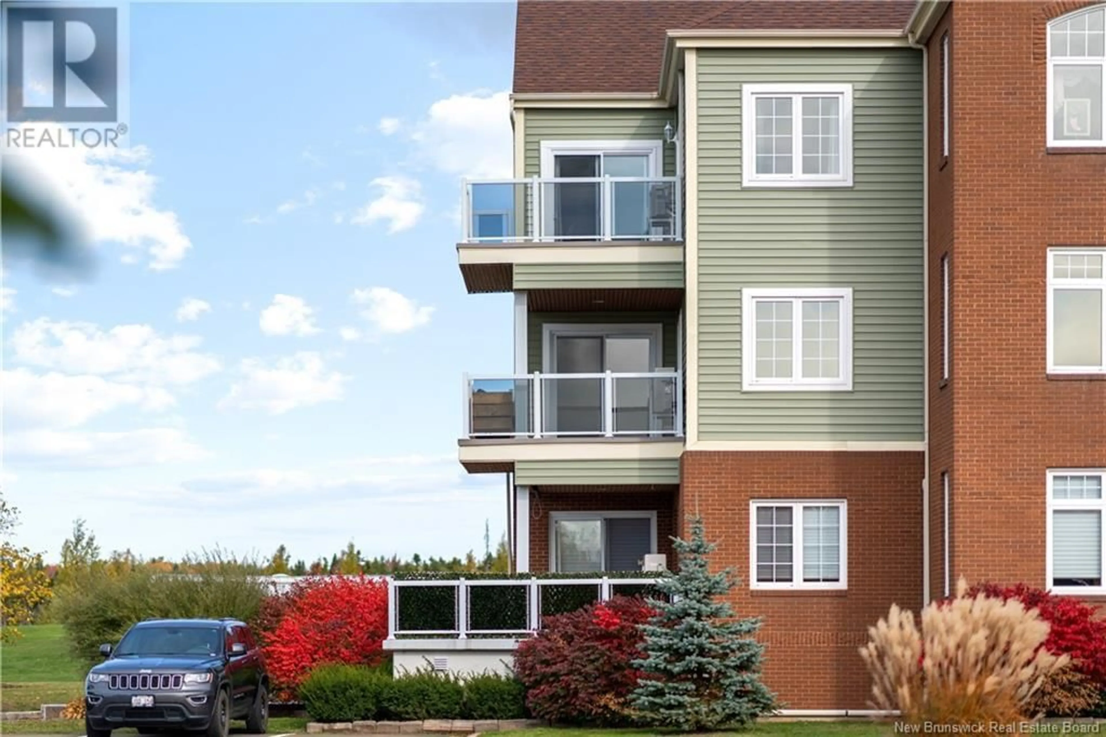 A pic from exterior of the house or condo, the front or back of building for 163 Royal Oaks Boulevard Unit# 201, Moncton New Brunswick E1H2C7