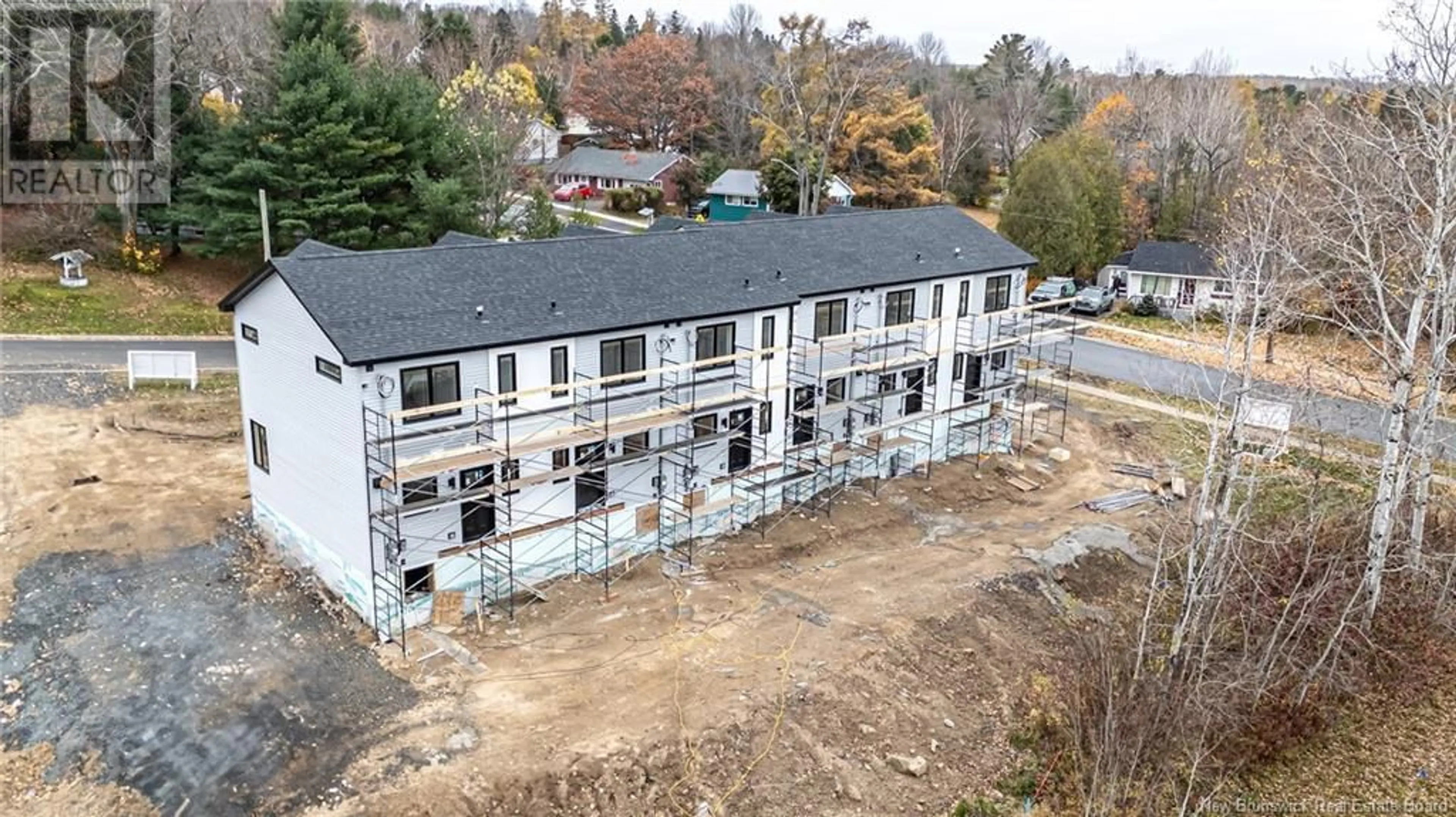 A pic from exterior of the house or condo, the front or back of building for 2 Westwood Drive, Fredericton New Brunswick E3C1K8