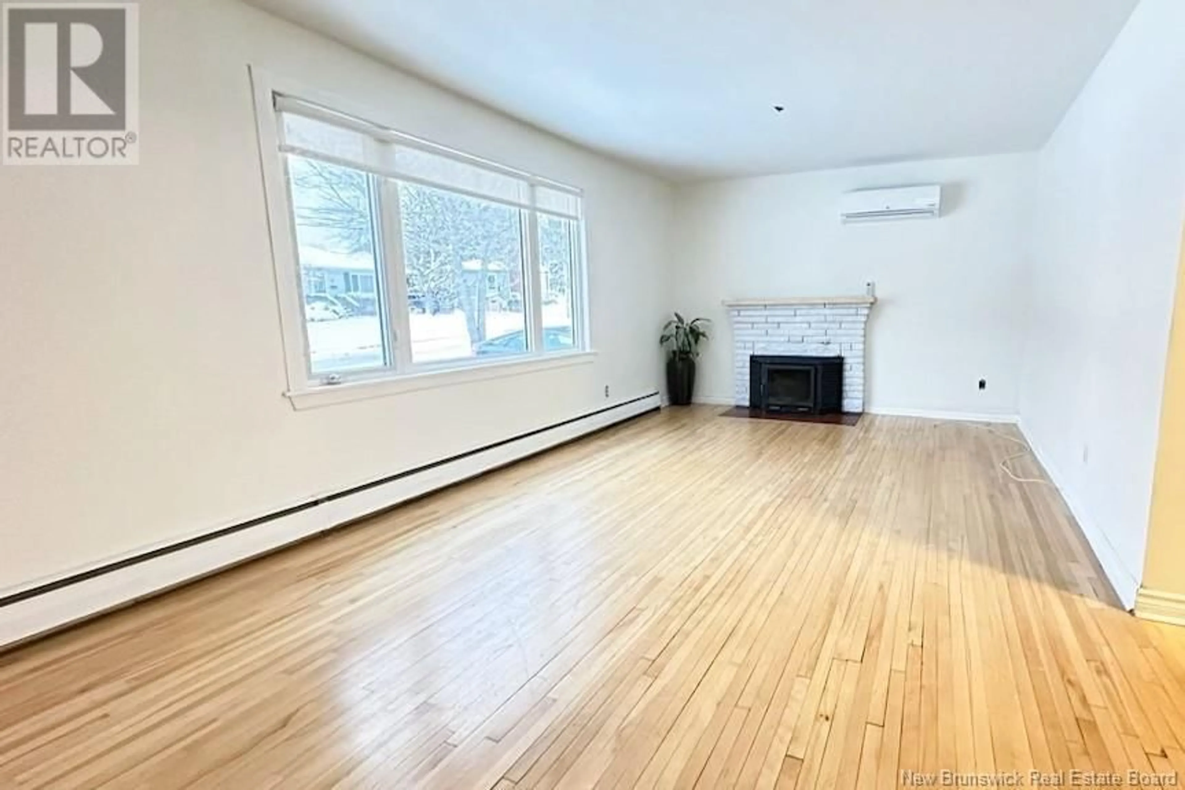 A pic of a room, wood floors for 16 Downsview Avenue, Moncton New Brunswick E1A4C5