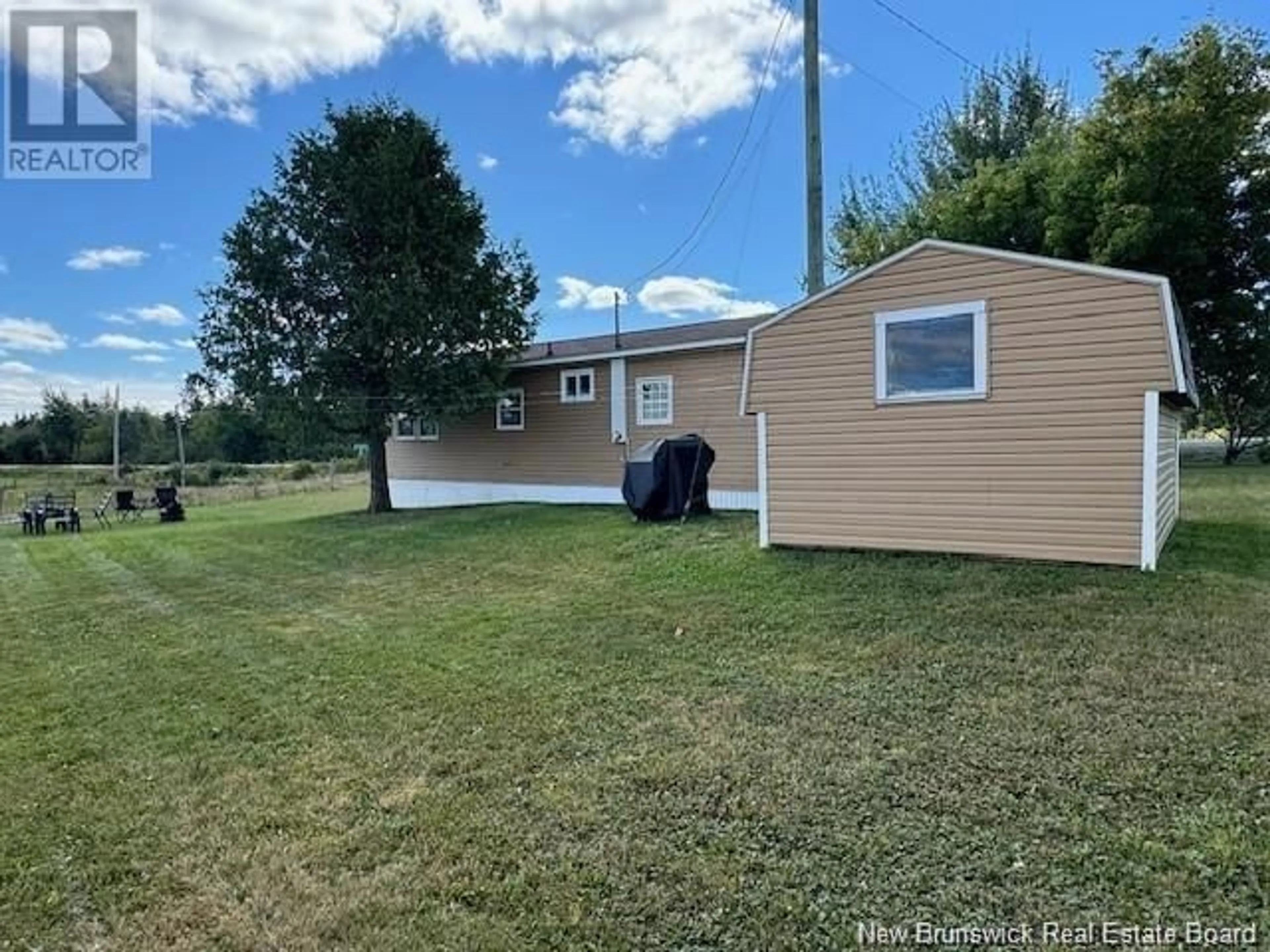 Frontside or backside of a home, the fenced backyard for 1379 Route 885, Salisbury New Brunswick E4Z5C9