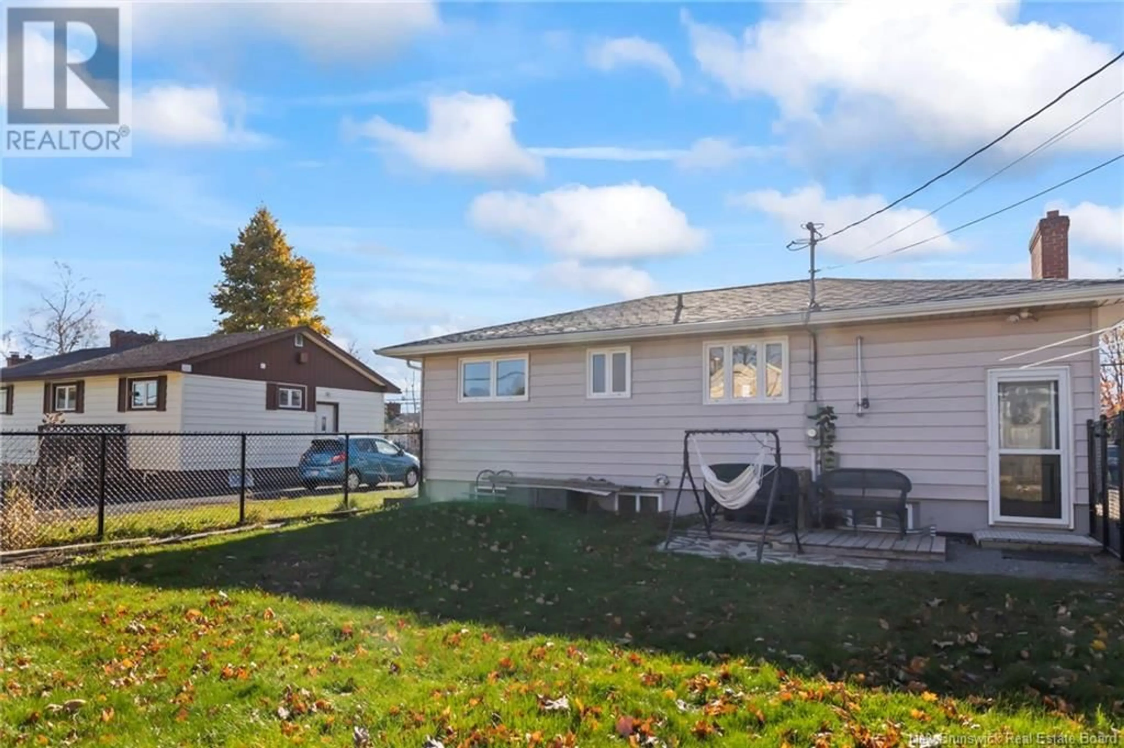 A pic from exterior of the house or condo, the fenced backyard for 151 Crandall Street, Moncton New Brunswick E1C4E1