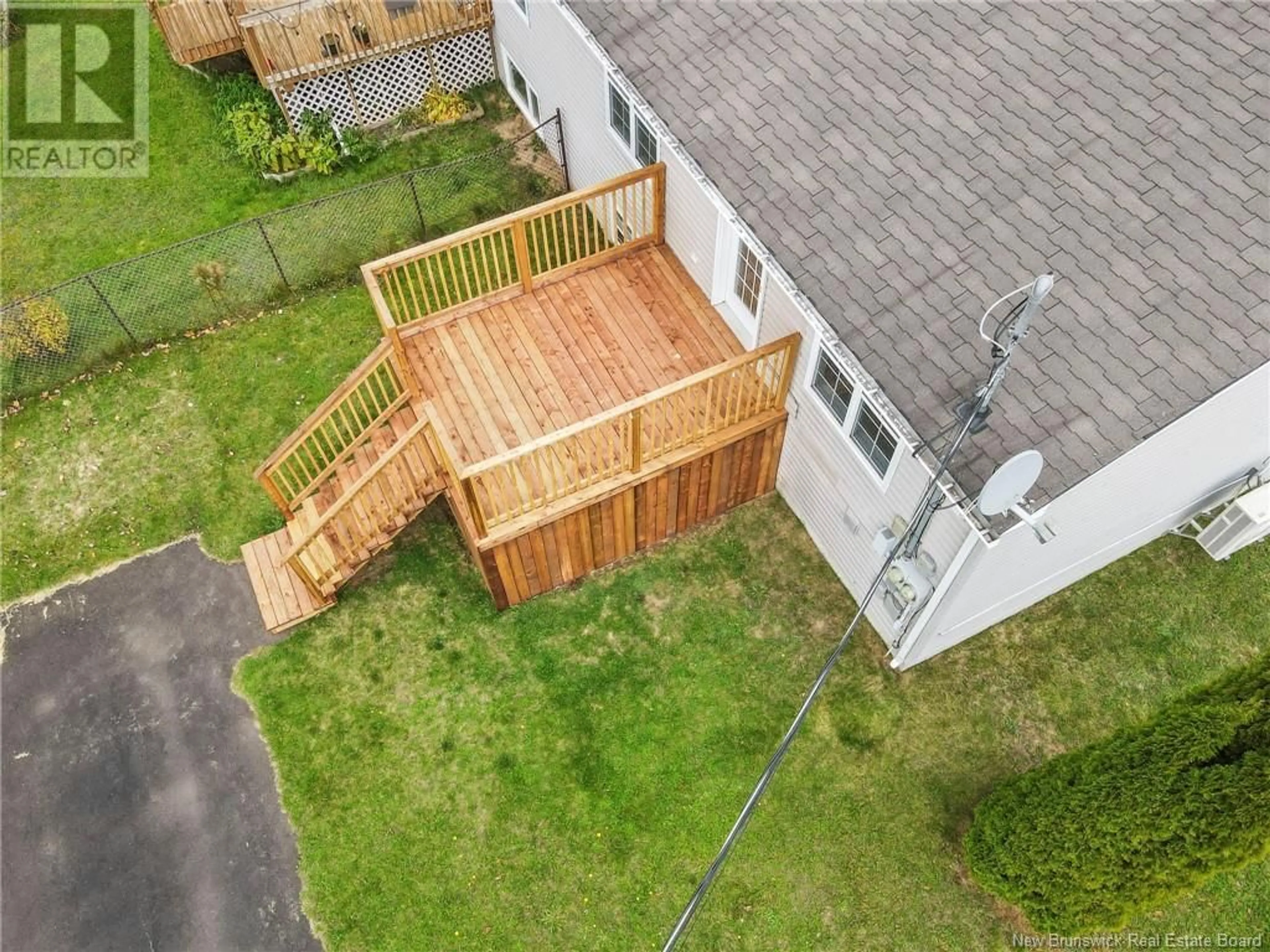 Frontside or backside of a home, the fenced backyard for 137 Mount Pleasant, Moncton New Brunswick E1G5J4