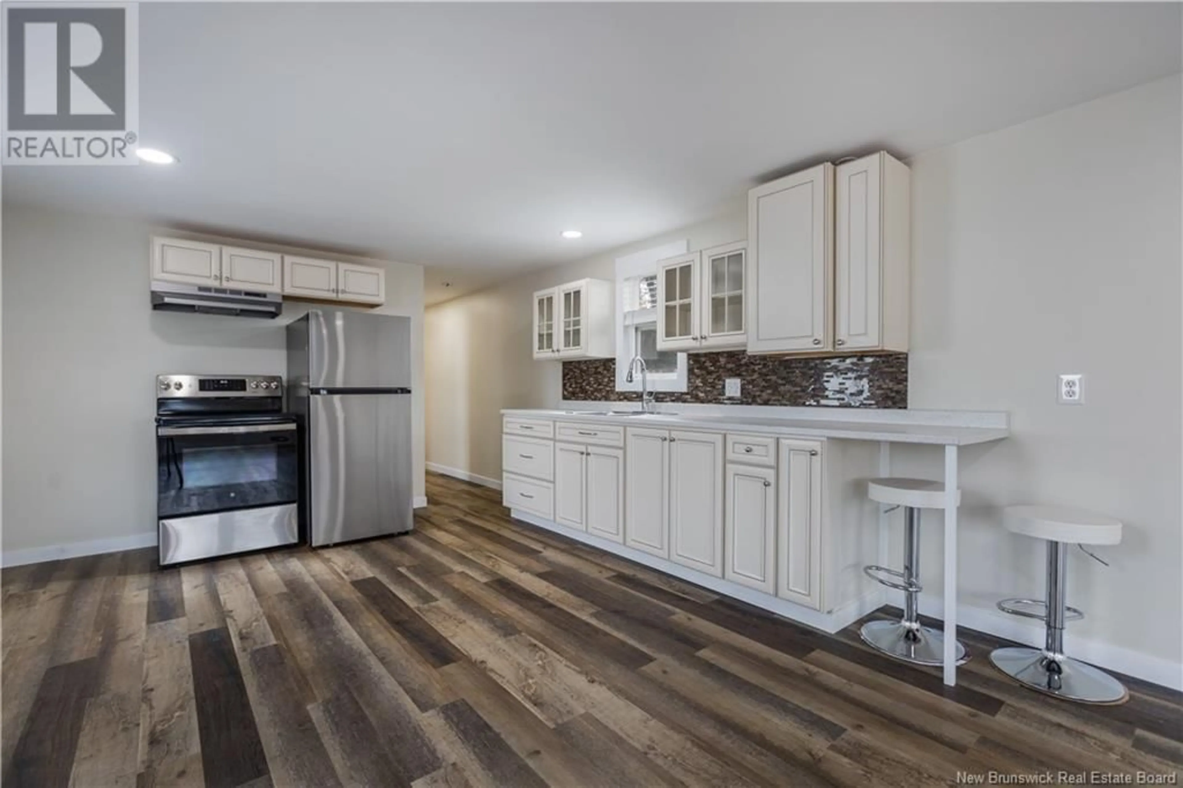 Open concept kitchen for 81 Biddington Avenue, Lakeville New Brunswick E1H1C2