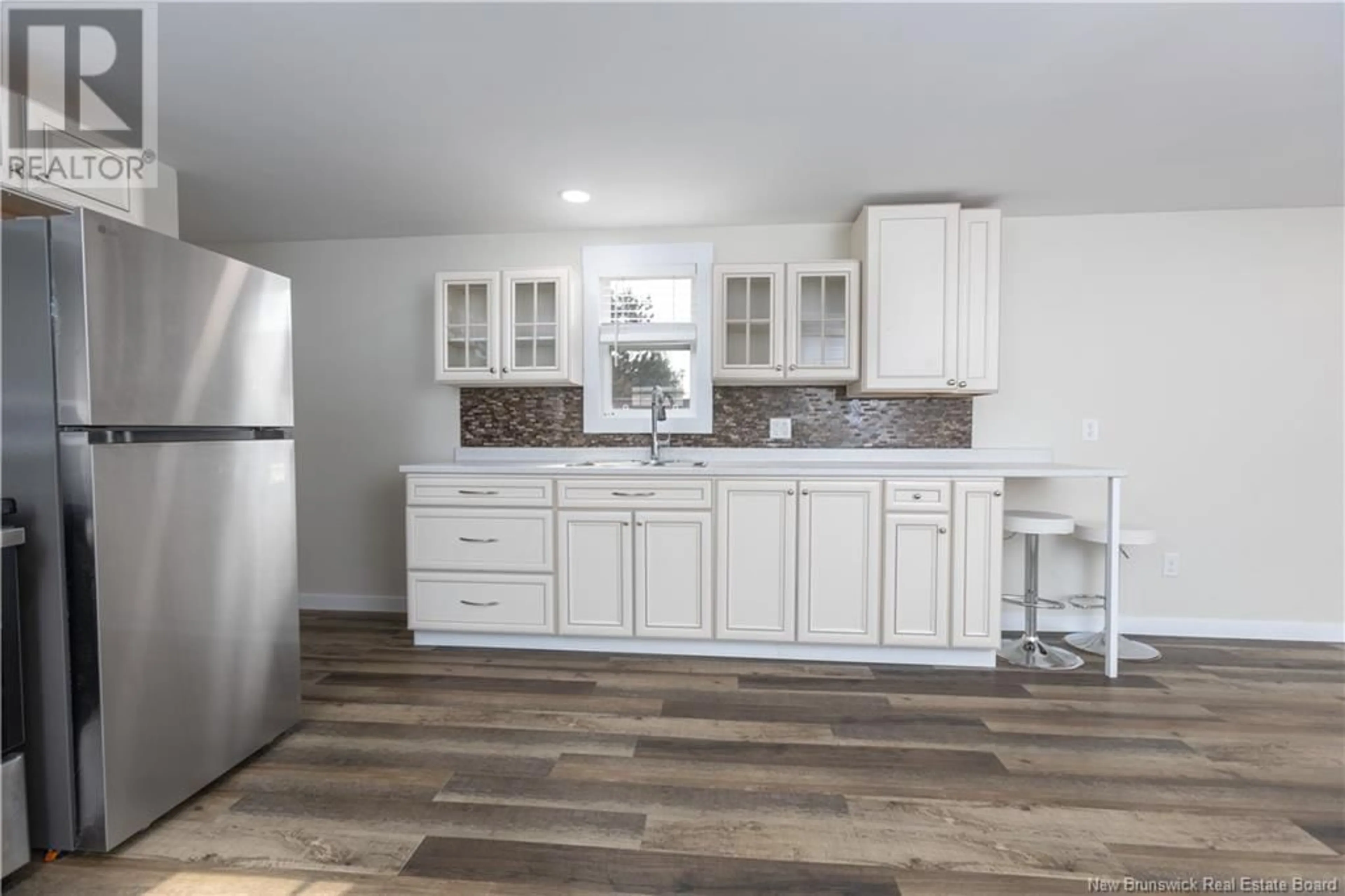 Open concept kitchen for 81 Biddington Avenue, Lakeville New Brunswick E1H1C2