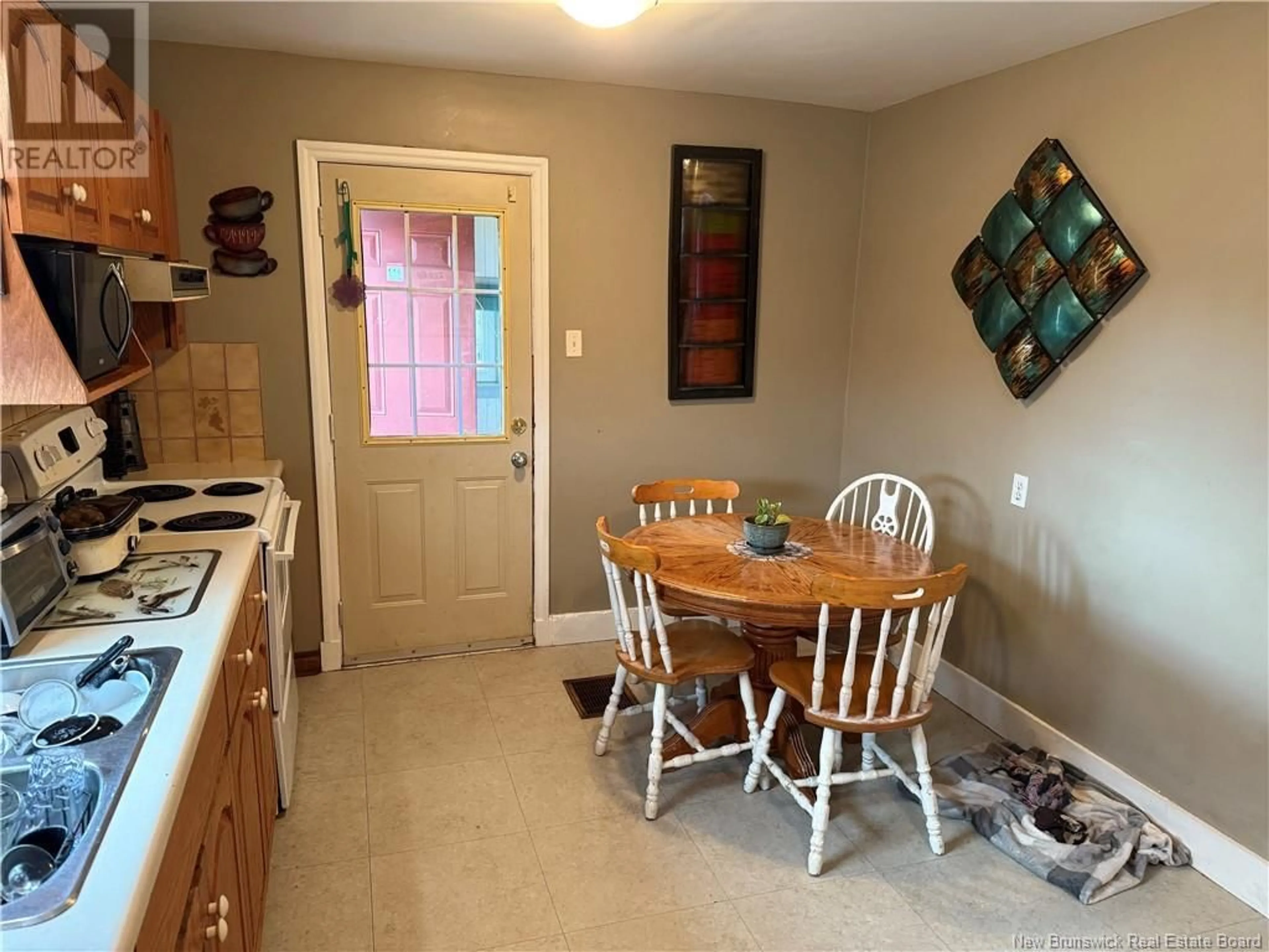 A pic of a room, wood floors for 604 Elmwood Drive, Moncton New Brunswick E1A2X5