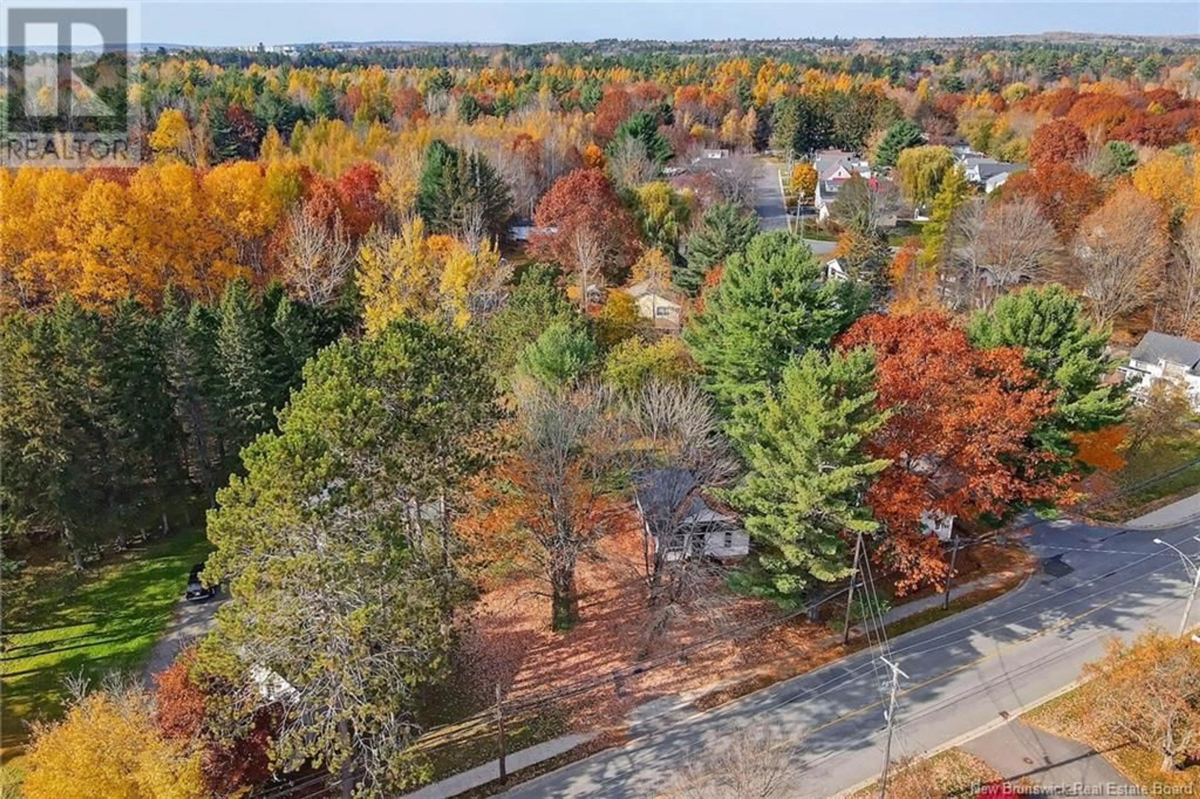 A pic from exterior of the house or condo, the fenced backyard for 143 Canada Street, Fredericton New Brunswick E3A3Z5