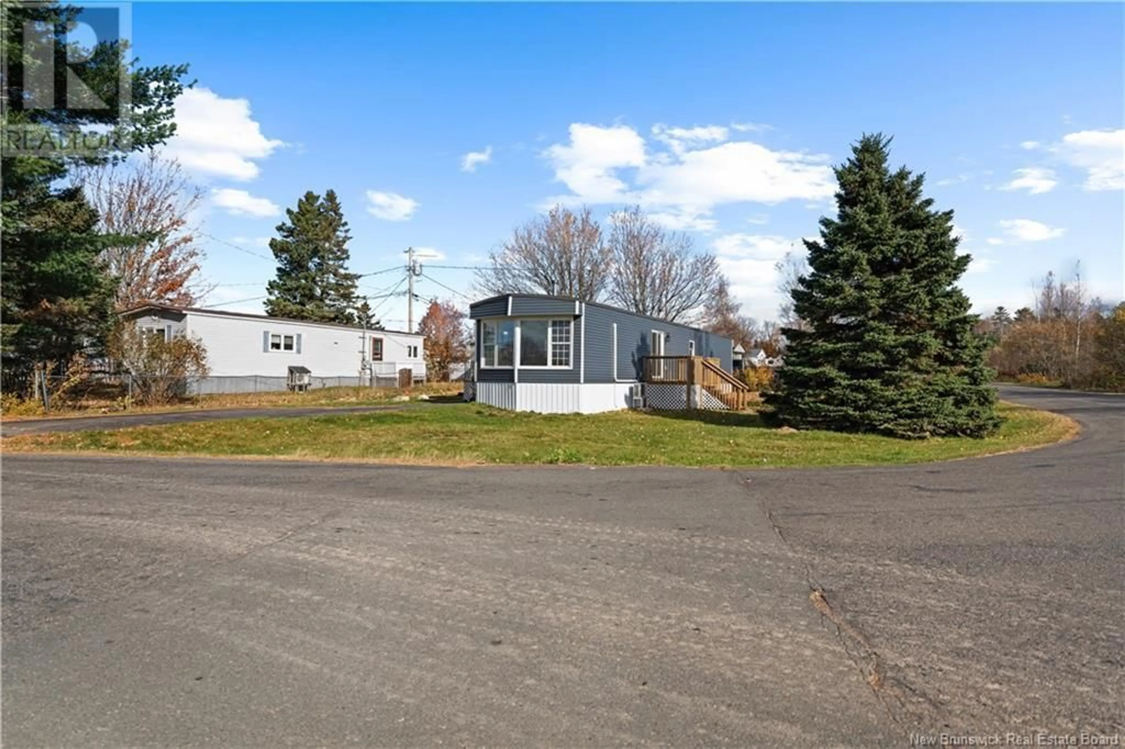 A pic from exterior of the house or condo, the fenced backyard for 1 Leawood Avenue, Lakeville New Brunswick E1H1M2