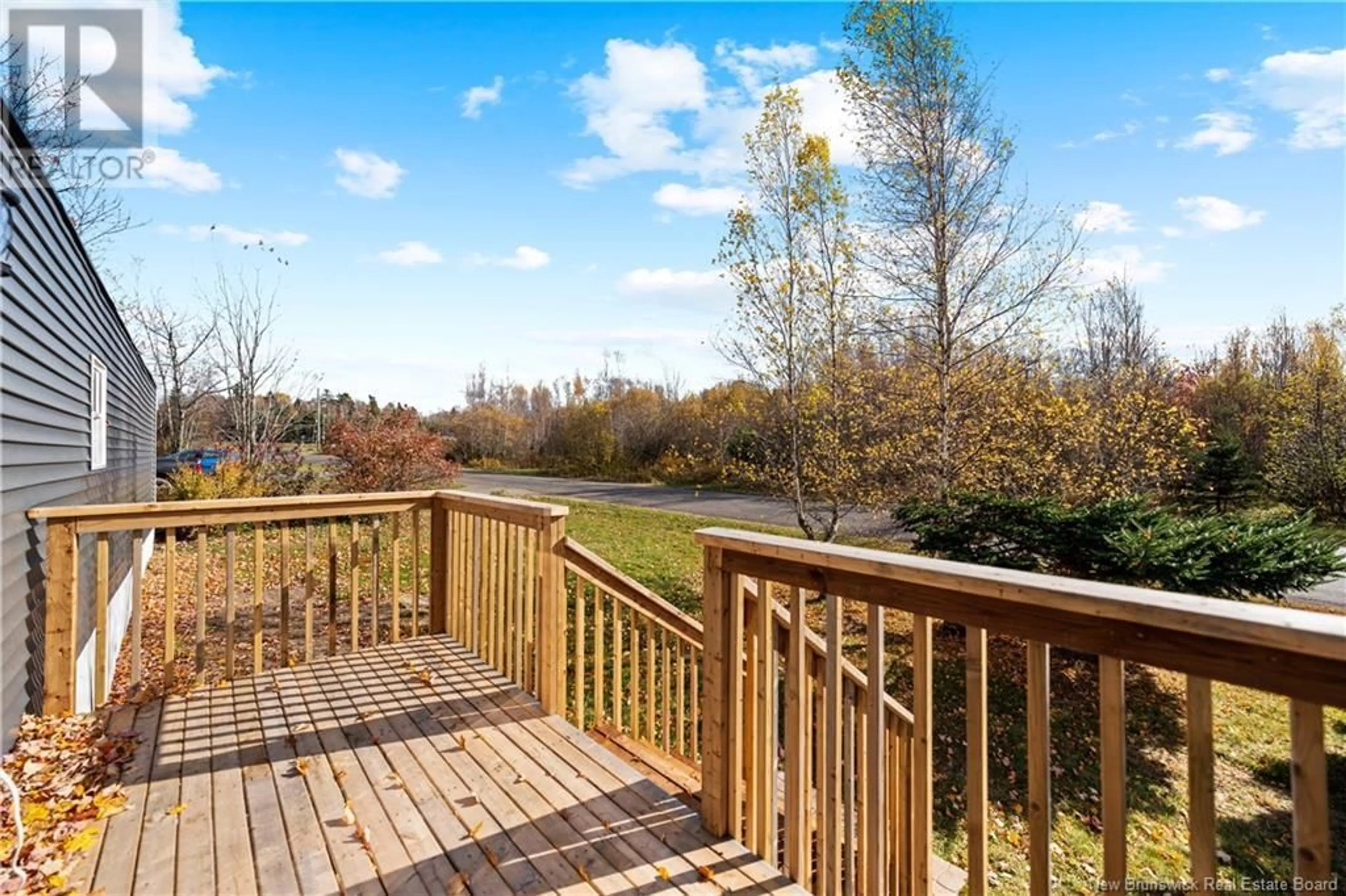 Patio, the fenced backyard for 1 Leawood Avenue, Lakeville New Brunswick E1H1M2