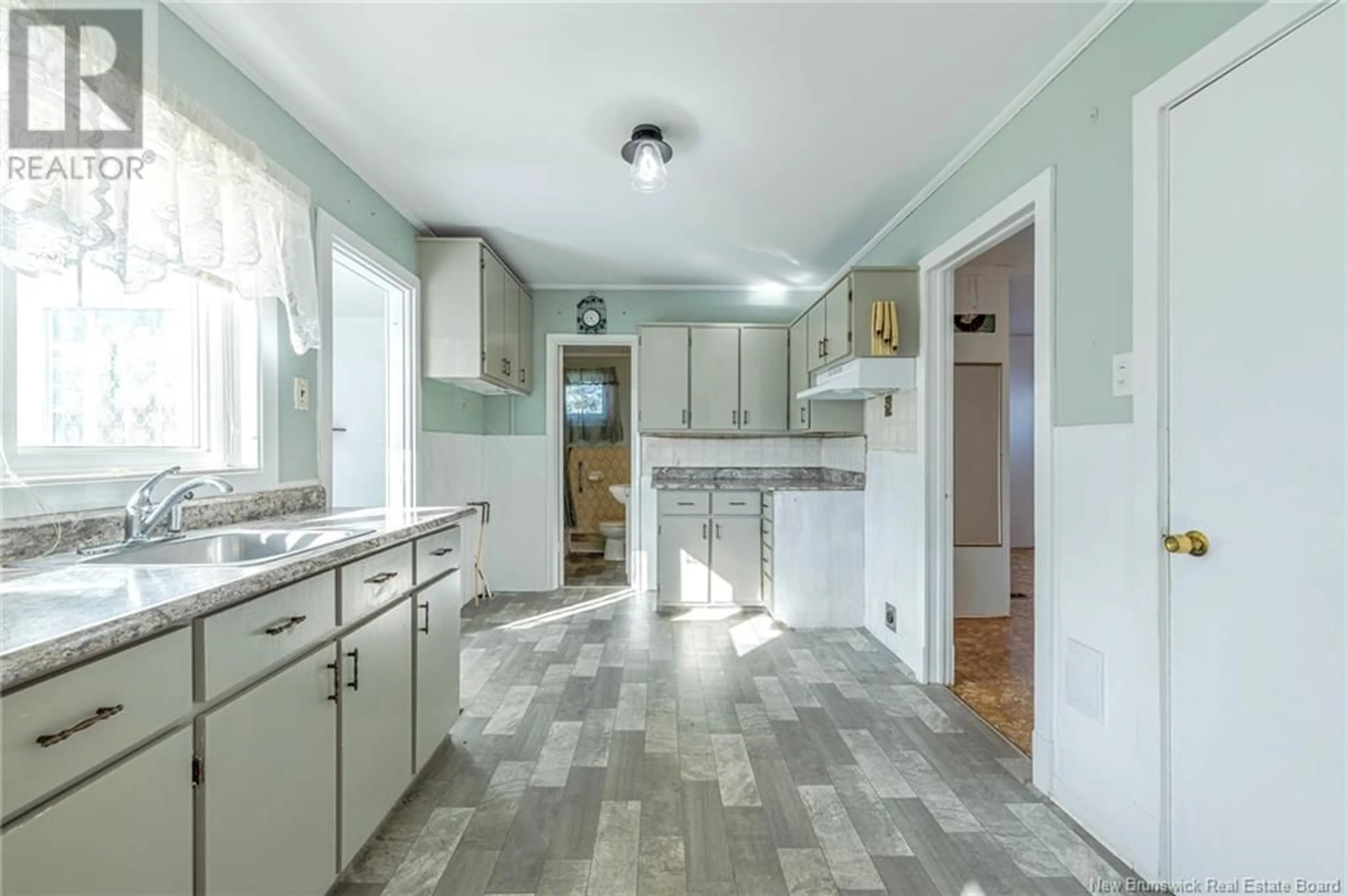 Kitchen, wood floors, cottage for 240 Acadie Street, Grande-Anse New Brunswick E8N1B3