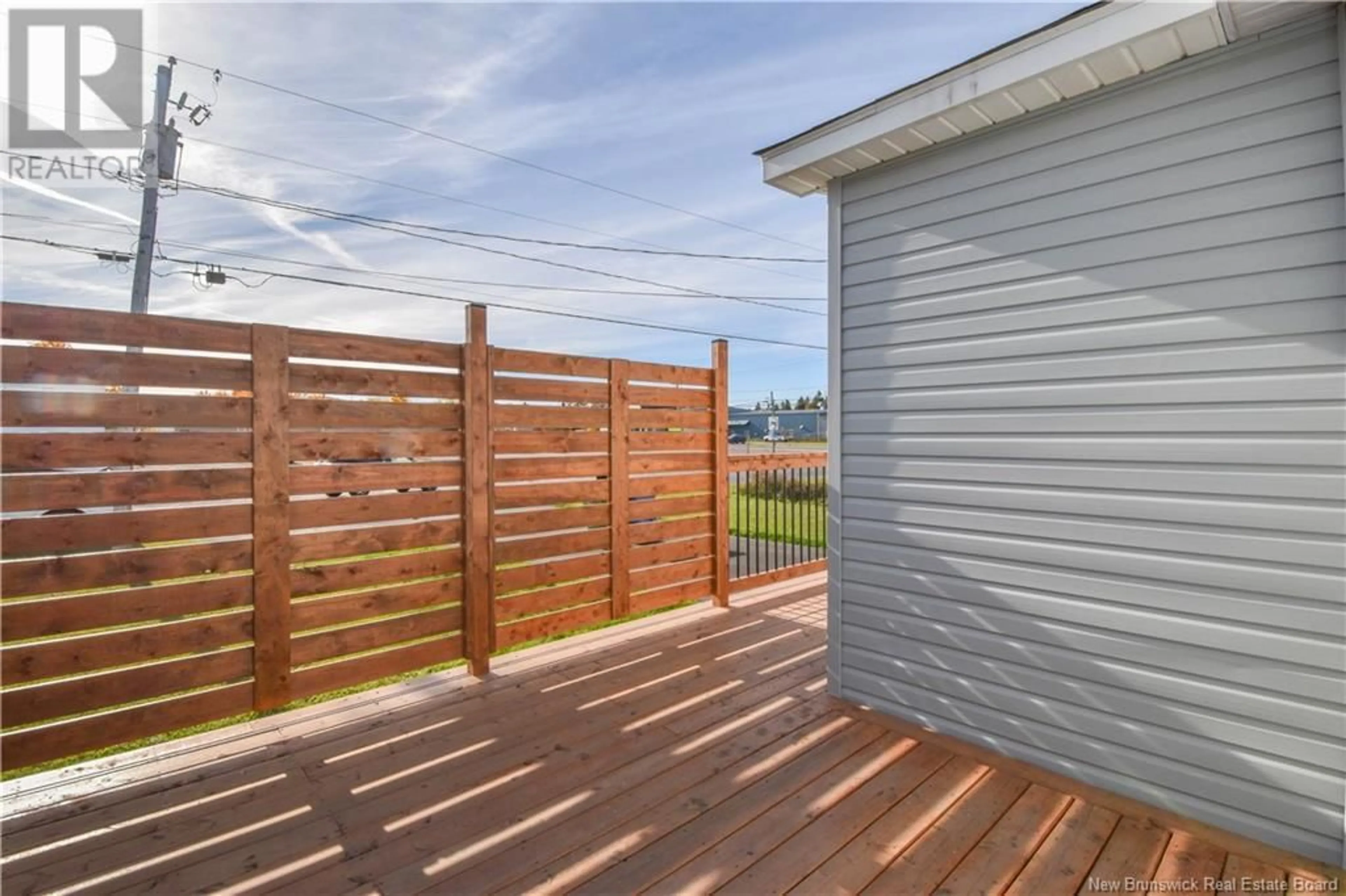 Patio, the fenced backyard for 215 2e rue Street, Shippagan New Brunswick E8S1T4