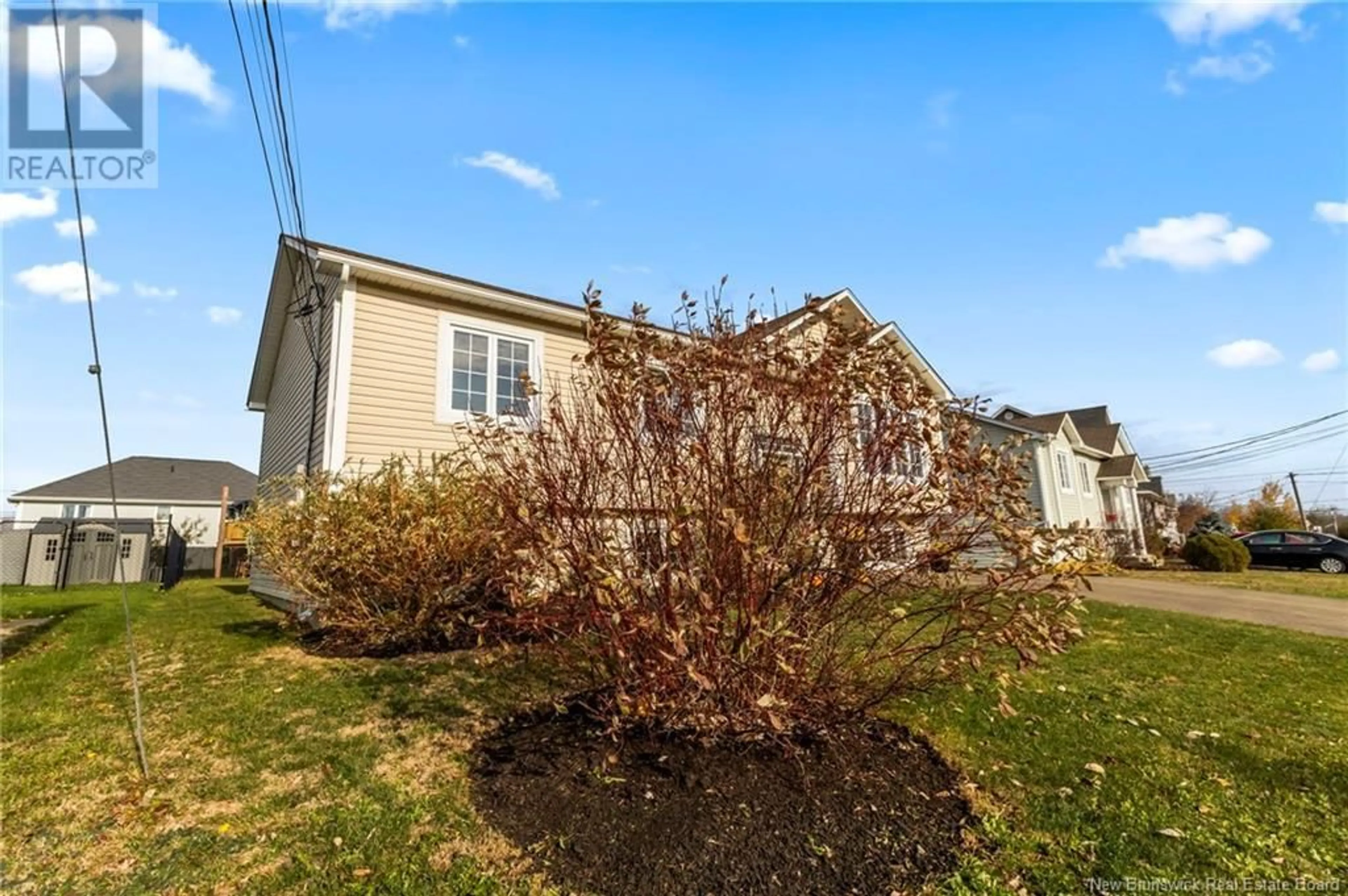 A pic from exterior of the house or condo, the fenced backyard for 333 Maplehurst Drive, Moncton New Brunswick E1G0E6