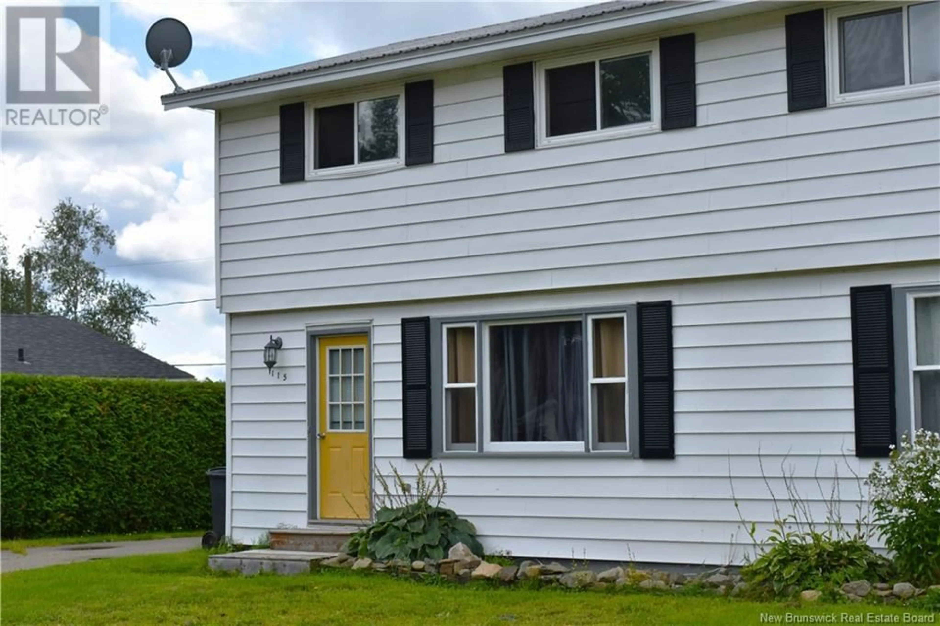 Home with vinyl exterior material for 115 Elizabeth Street, Woodstock New Brunswick E7M1P8