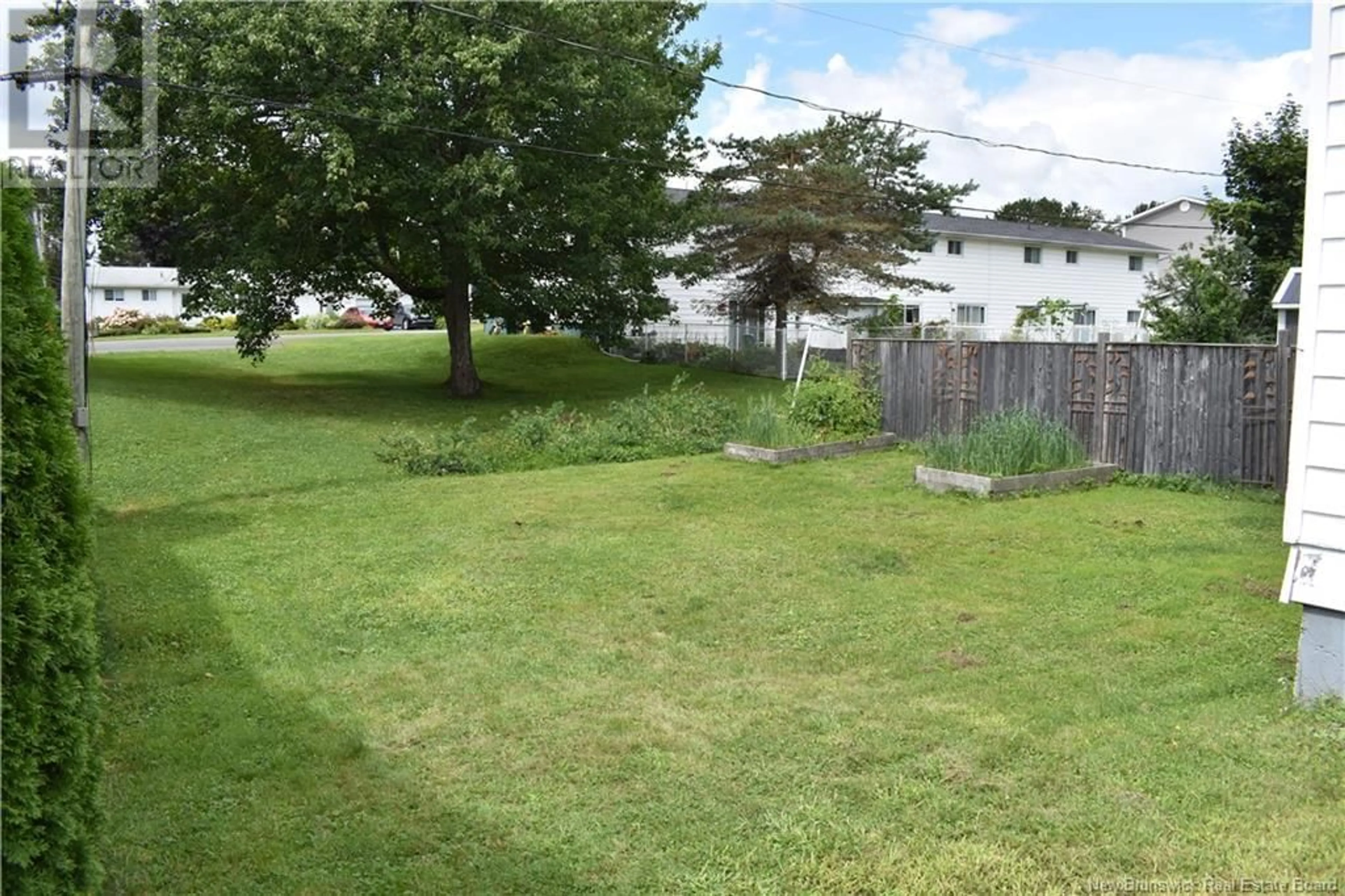 Patio, the fenced backyard for 115 Elizabeth Street, Woodstock New Brunswick E7M1P8