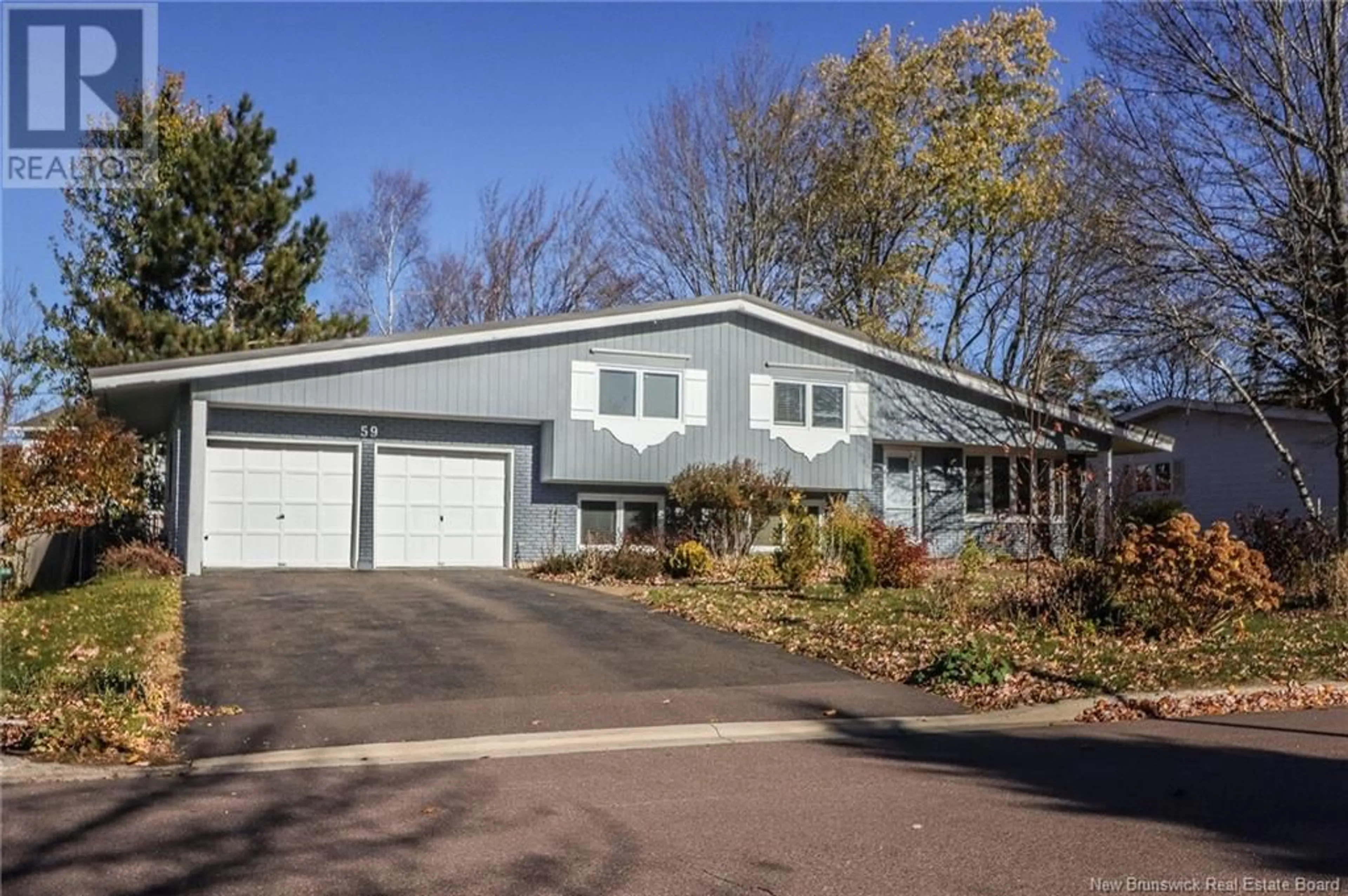 Frontside or backside of a home, the street view for 59 Berkley Drive, Riverview New Brunswick E1B2L4