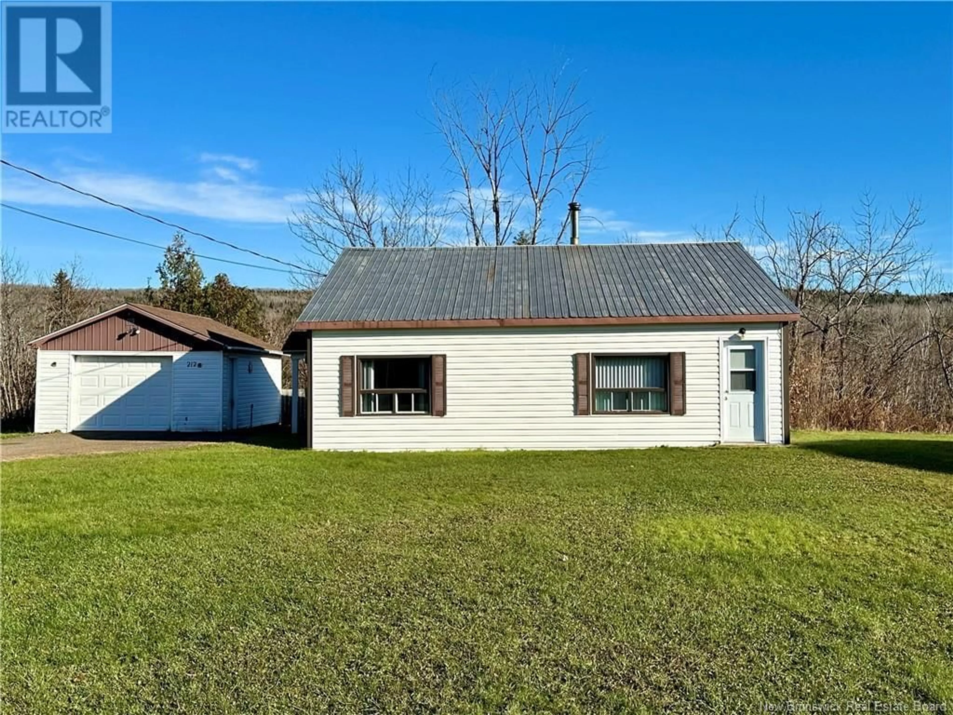 Frontside or backside of a home, cottage for 212 Main Street, Aroostook New Brunswick E7H2Z7