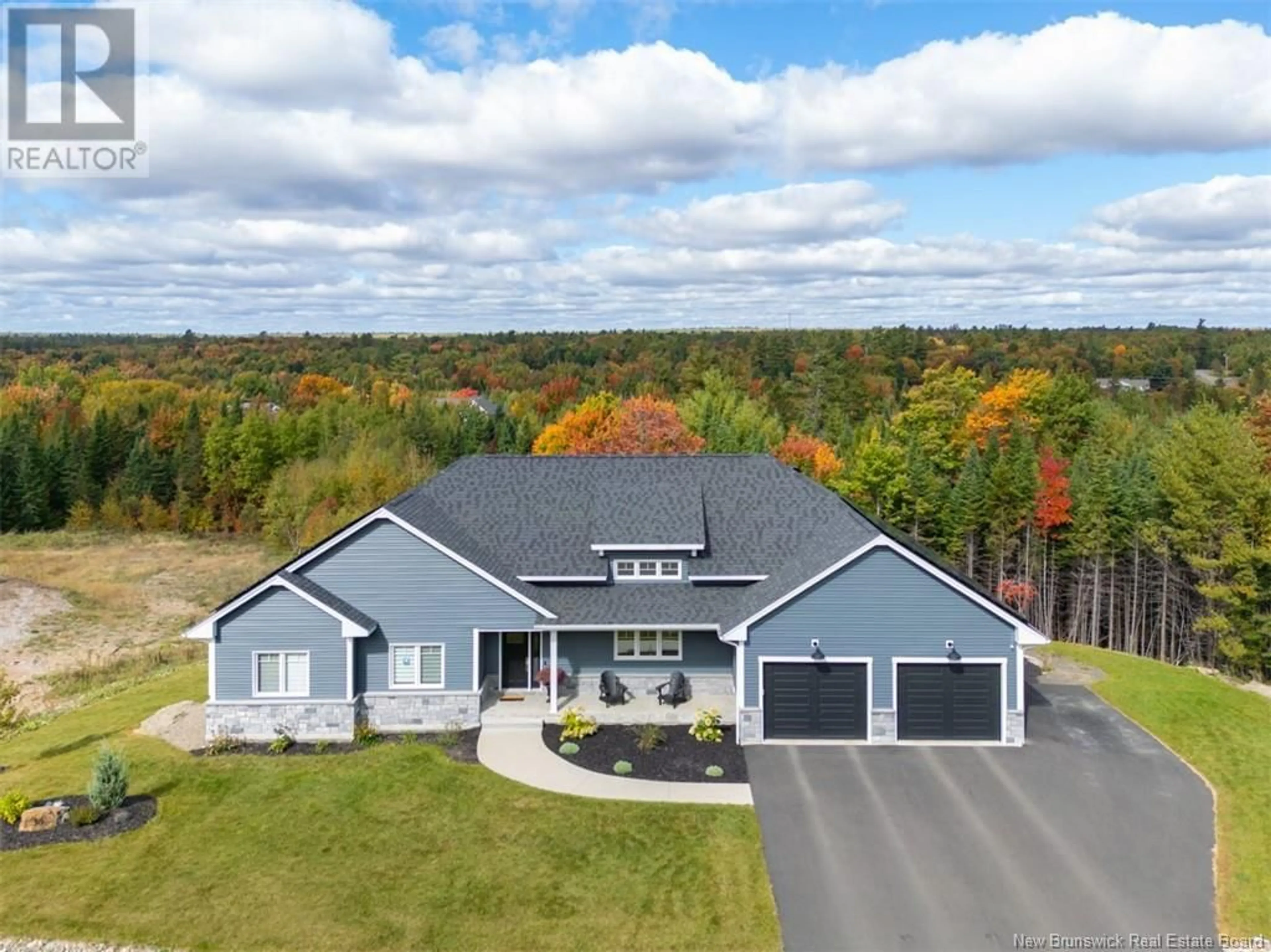 Frontside or backside of a home, the street view for 36 Golden Eagle Drive, Hanwell New Brunswick E3C0H3