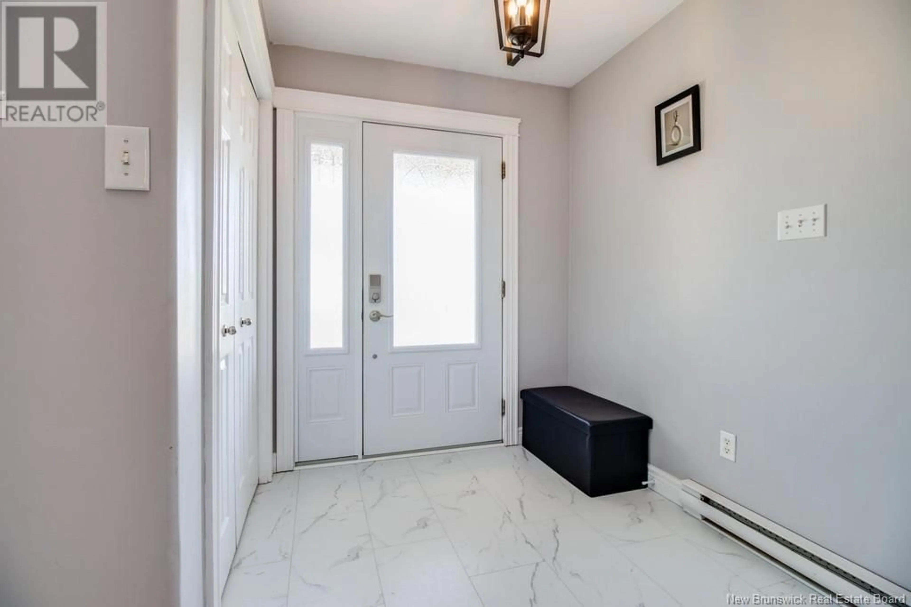 Indoor entryway, cement floor for 33 Dawson Drive, Oromocto New Brunswick E2V4S9