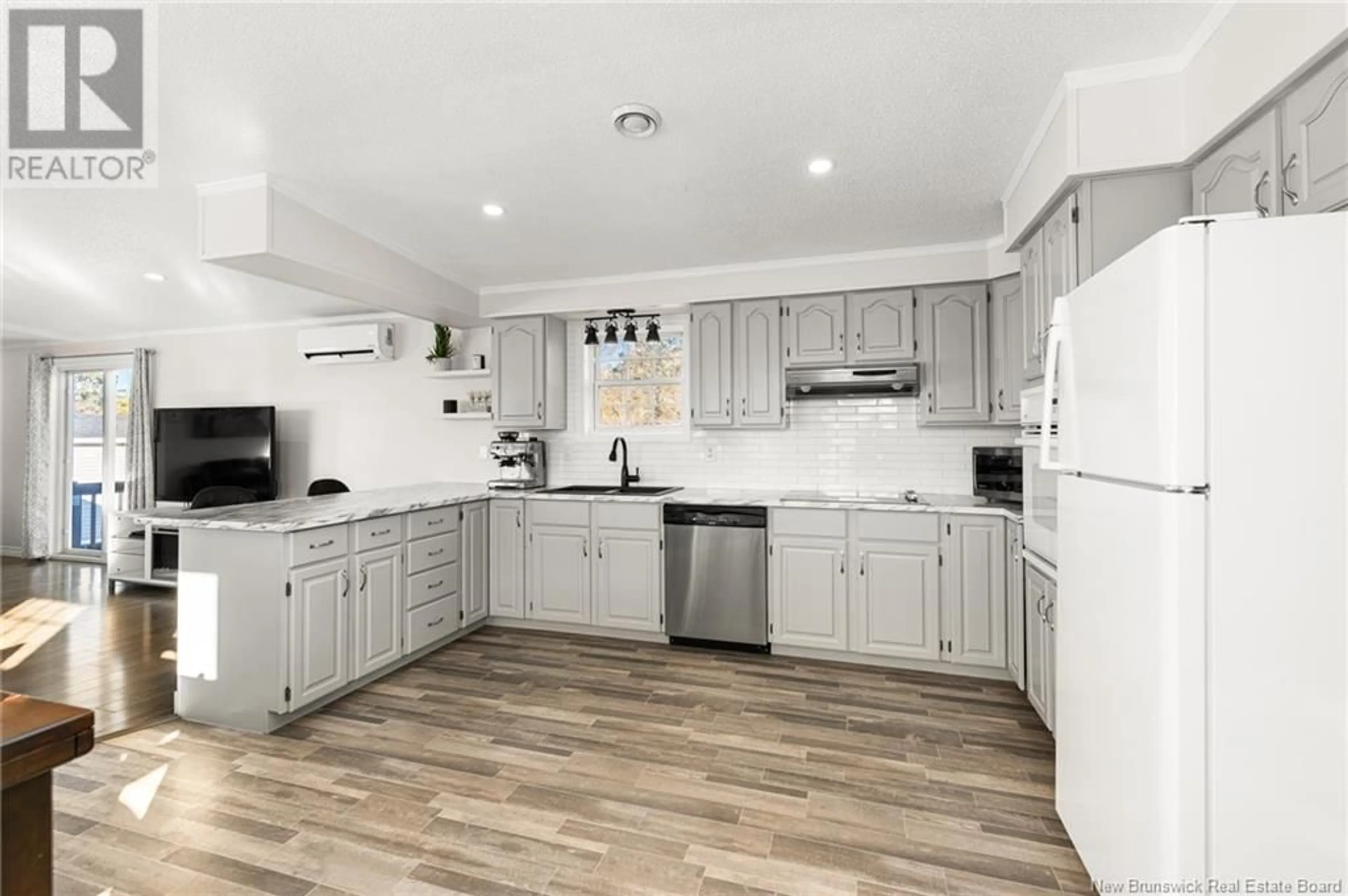 Open concept kitchen for 208 Nepisiguit Drive, Dieppe New Brunswick E1A7N1