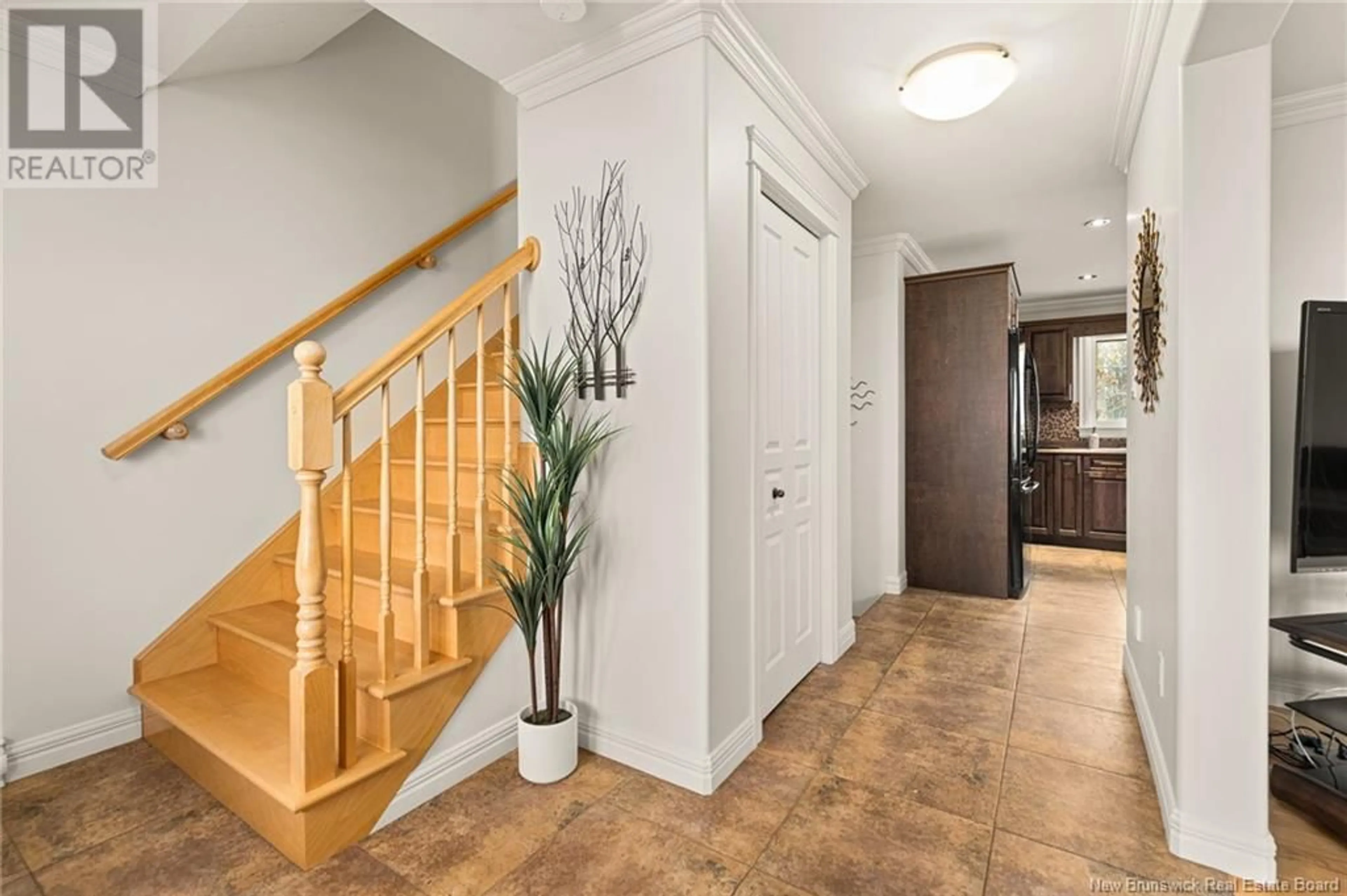 Indoor foyer, wood floors for 16 Eugene Court, Dieppe New Brunswick E1A0P2