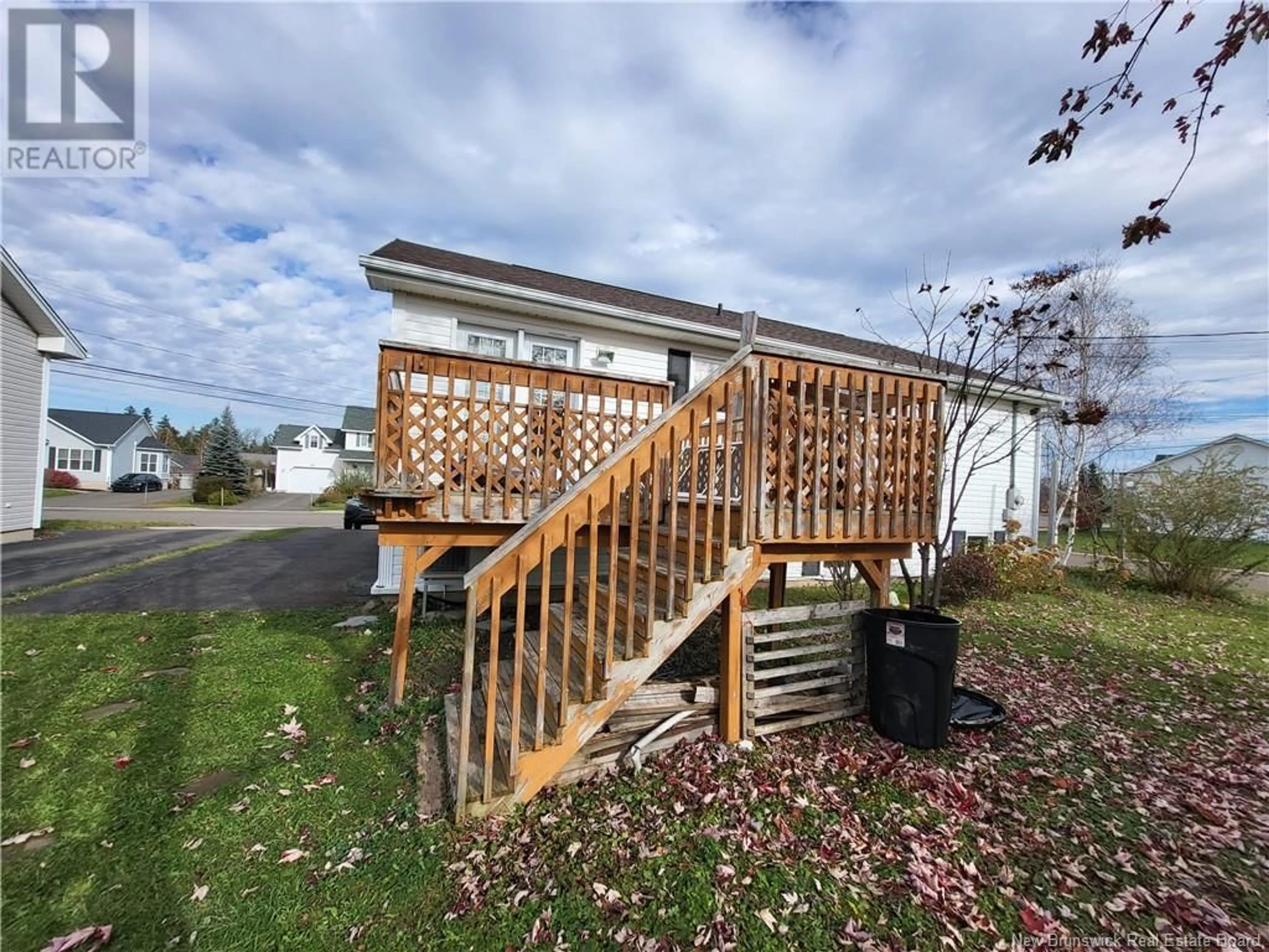 A pic from exterior of the house or condo, the fenced backyard for 198 Bulman Drive, Moncton New Brunswick E1G5B9