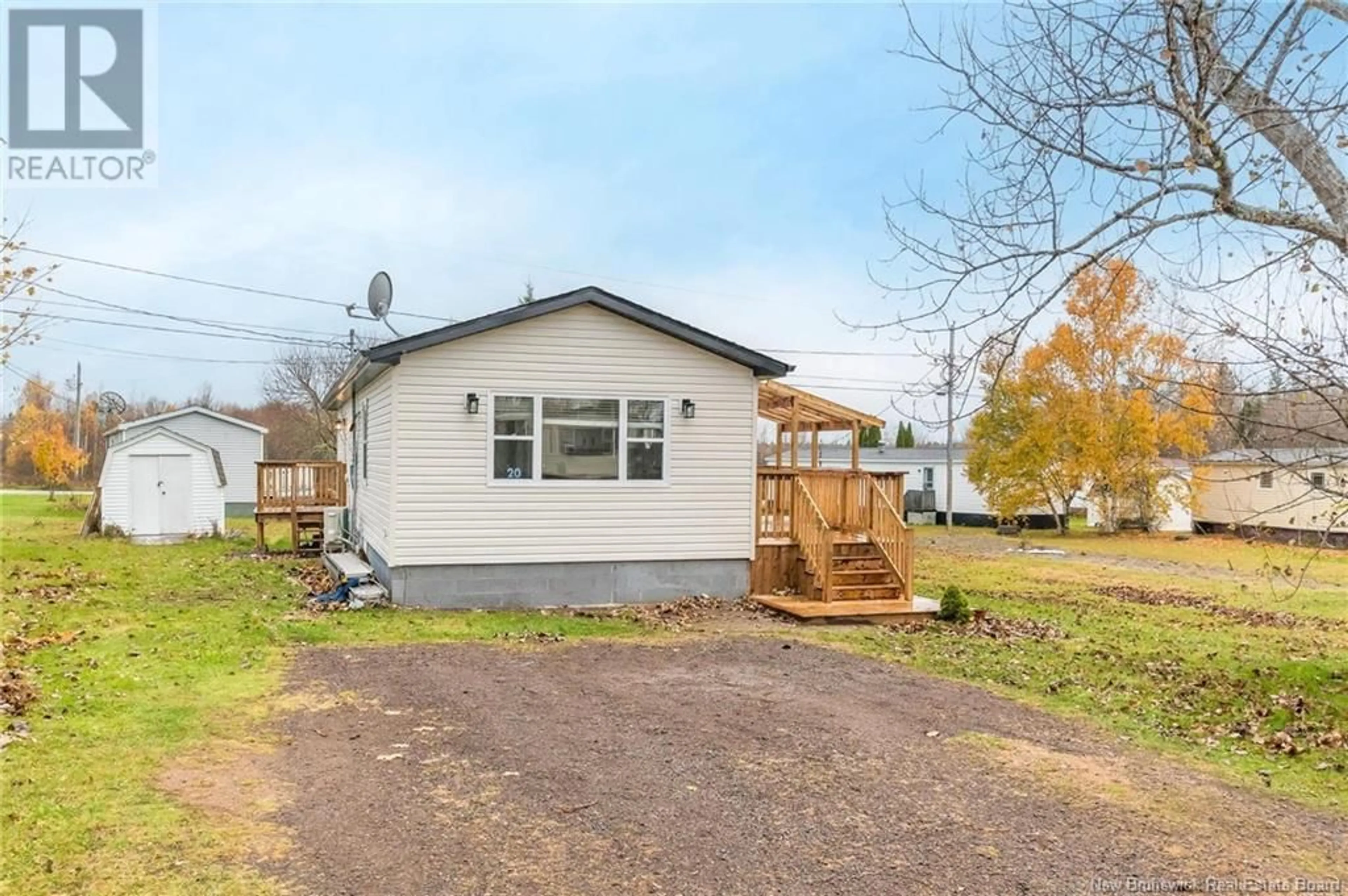 Frontside or backside of a home, cottage for 20 Tait Crescent, Lakeville New Brunswick E1H1K5