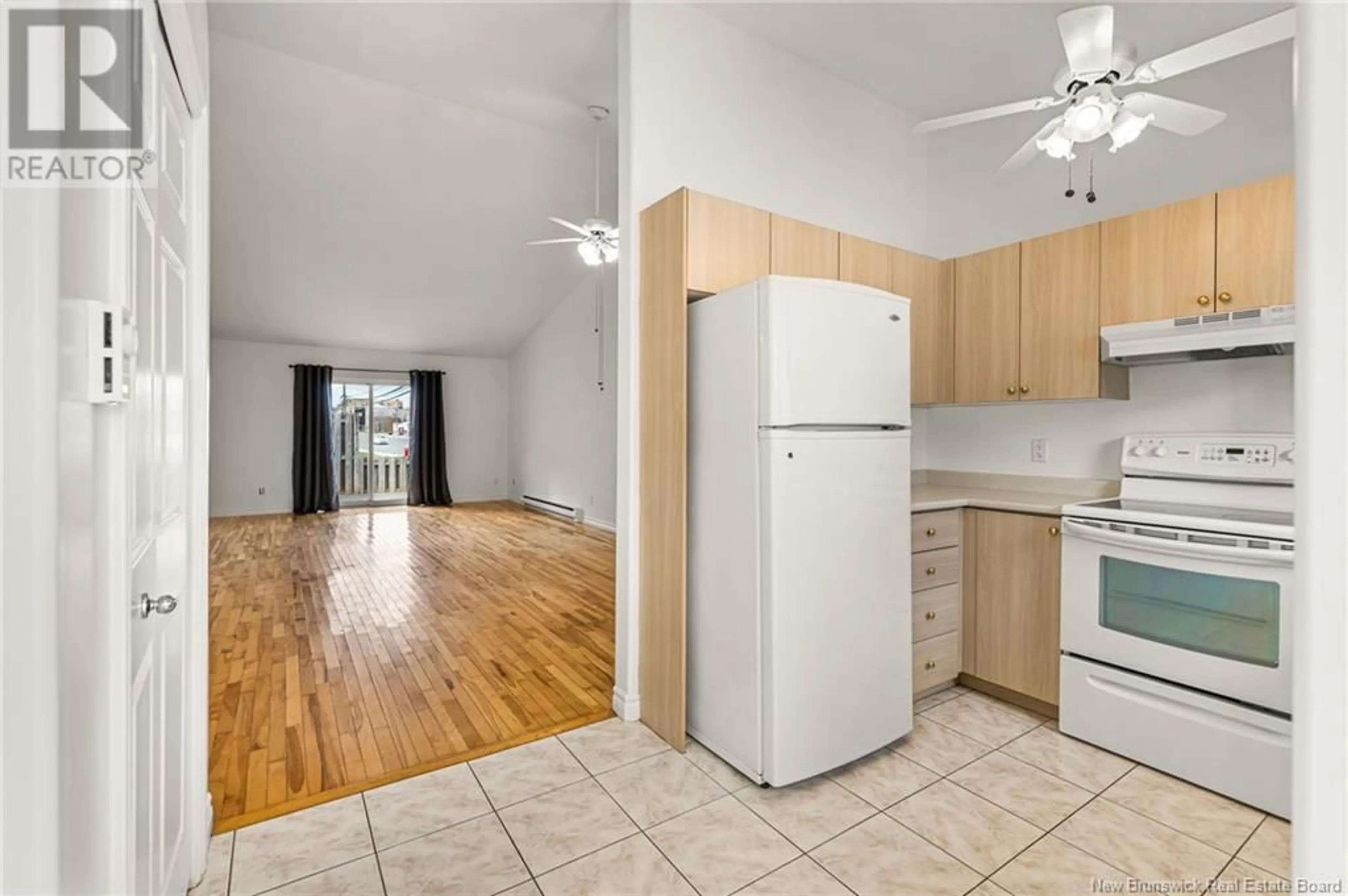 Standard kitchen, wood floors, cottage for 380 Champlain Street Unit# 1, Dieppe New Brunswick E1A1P3