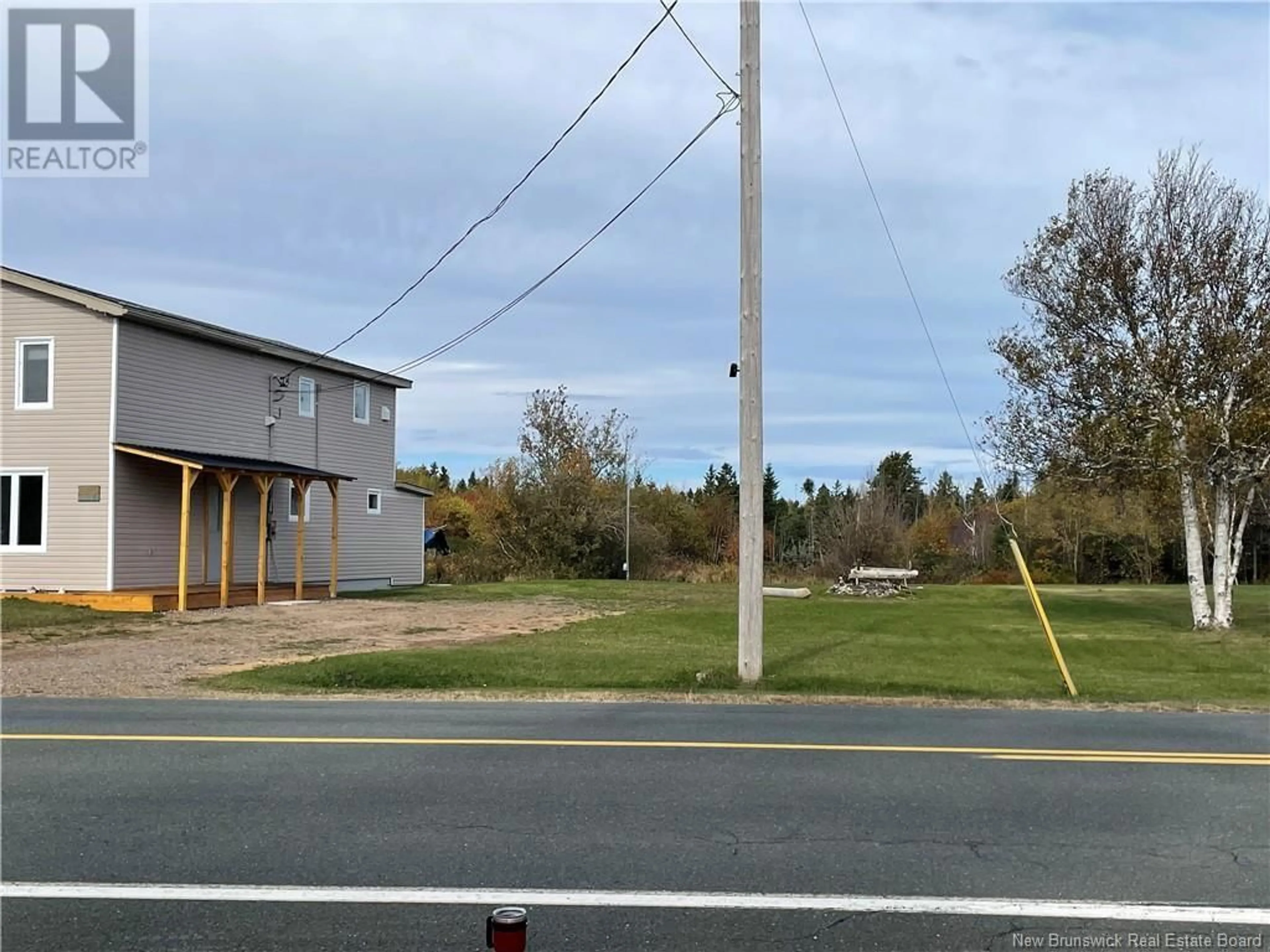 Frontside or backside of a home, the street view for 965 Chiasson, Chiasson Office New Brunswick E8S2W9