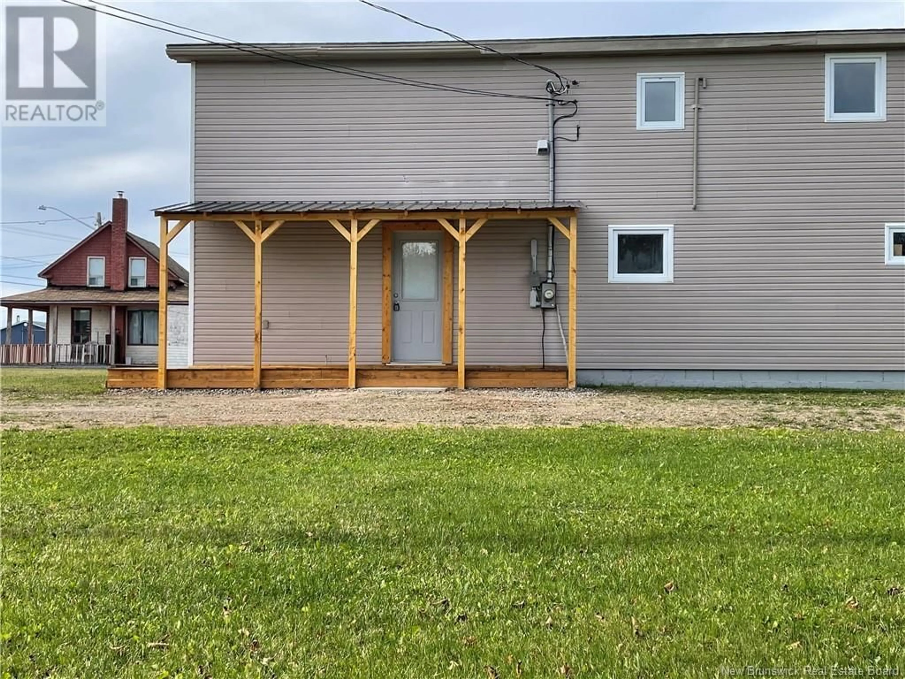 Frontside or backside of a home, the fenced backyard for 965 Chiasson, Chiasson Office New Brunswick E8S2W9