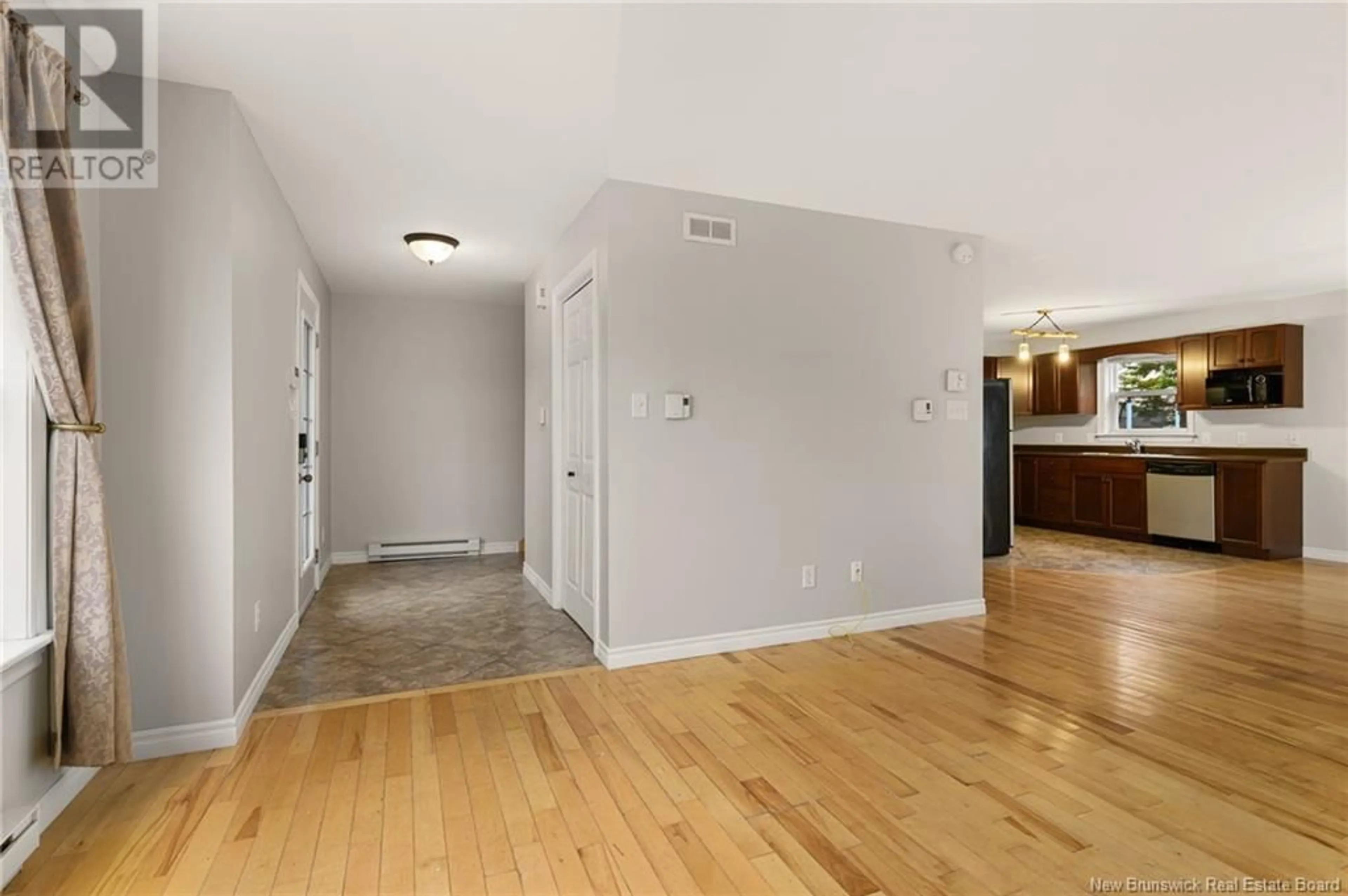 A pic of a room, wood floors for 131 Fortune, Dieppe New Brunswick E1A8T6