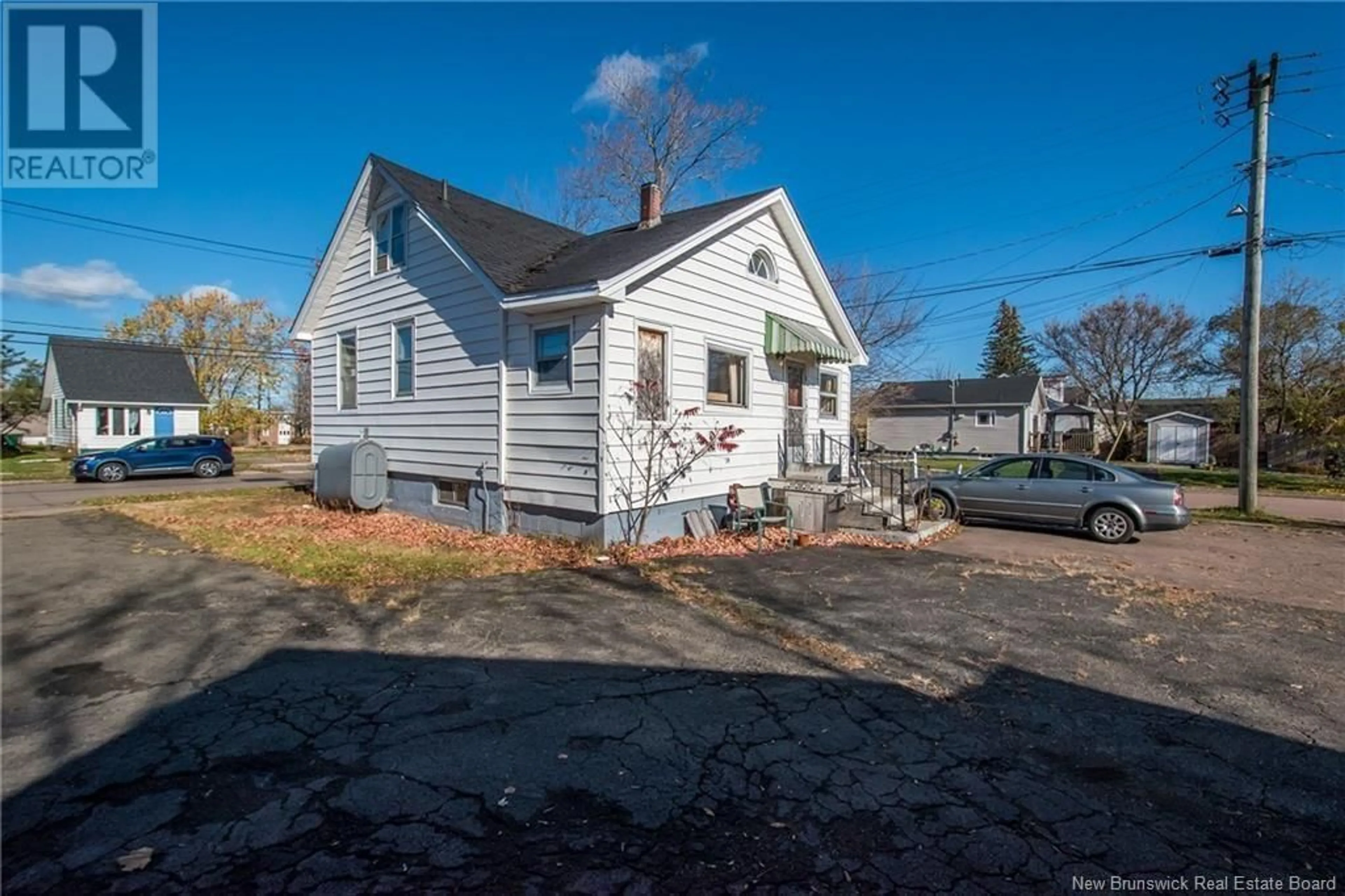 Frontside or backside of a home, the fenced backyard for 44 Chapman Street, Moncton New Brunswick E1E1K8