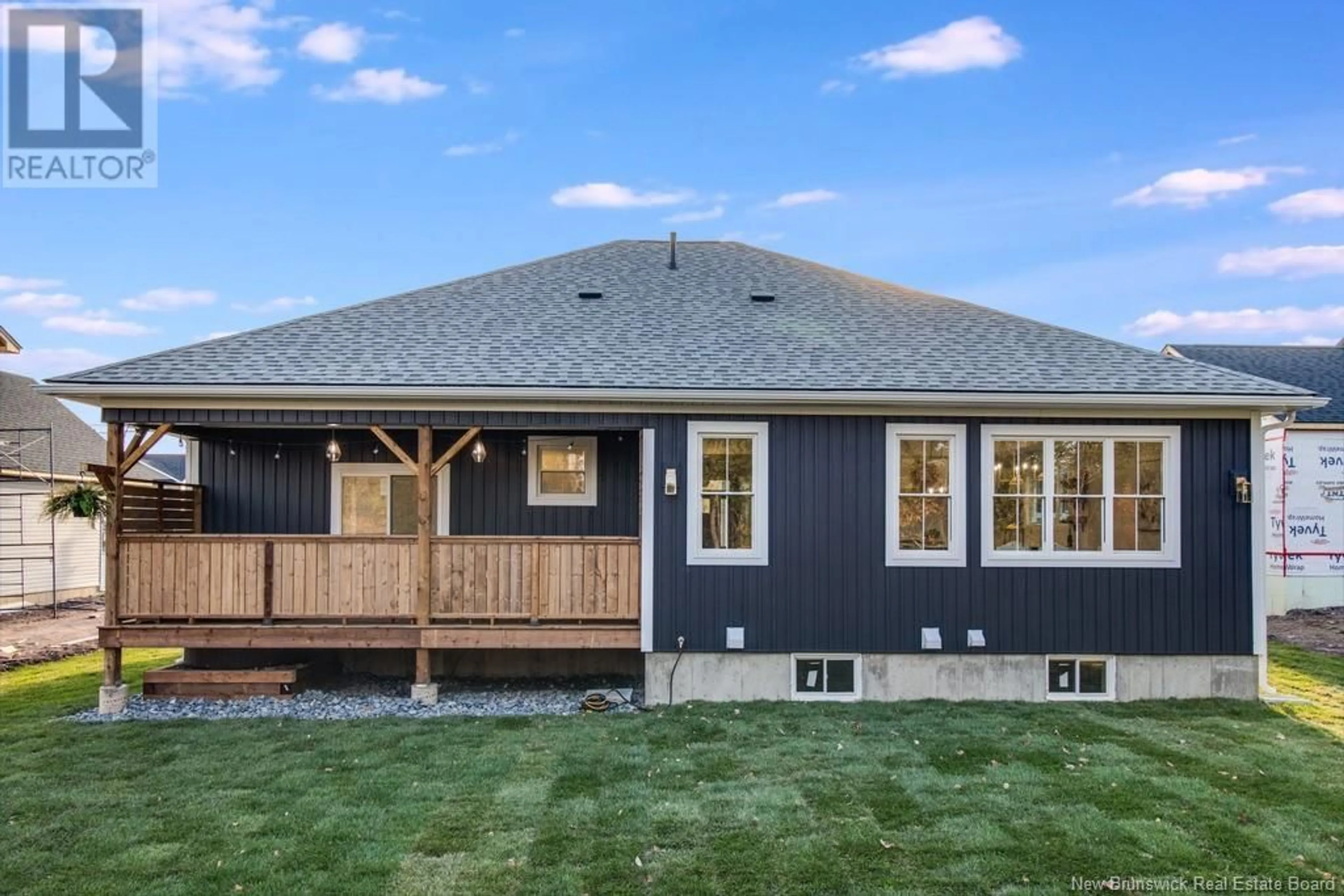 Frontside or backside of a home, the fenced backyard for 37 Boxwood Lane, New Maryland New Brunswick E3C0R7