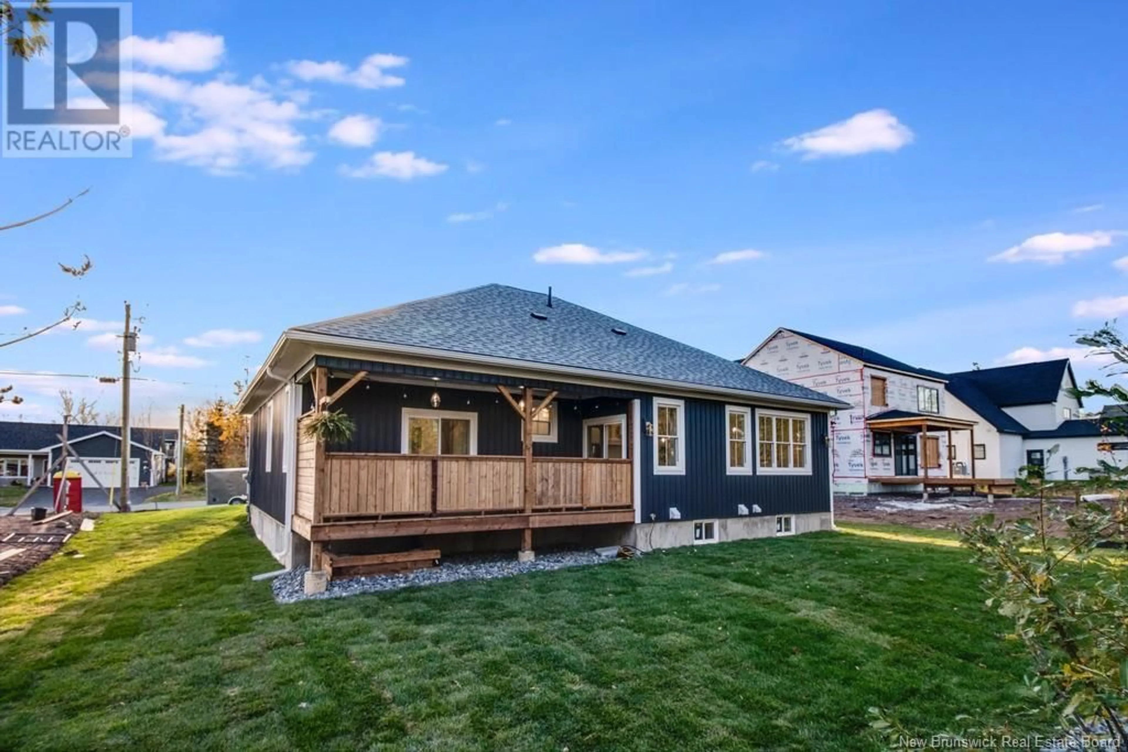 Frontside or backside of a home, the fenced backyard for 37 Boxwood Lane, New Maryland New Brunswick E3C0R7